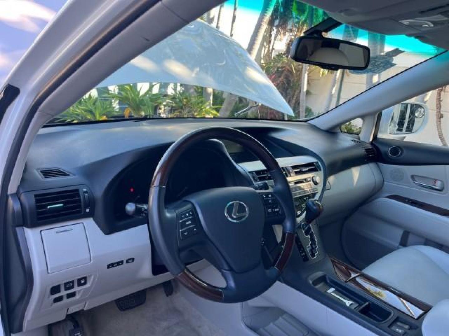 2010 Starfire Pearl /Parchment Lexus RX 350 1 FL LOW MILES 65,074 (JTJZK1BA1A2) with an 3.5L DOHC SFI 24-Valve V6 Engine engine, Automatic transmission, located at 4701 North Dixie Hwy, Pompano Beach, FL, 33064, (954) 422-2889, 26.240938, -80.123474 - OUR WEBPAGE FLORIDACARS1.COM HAS OVER 100 PHOTOS AND FREE CARFAX LINK 2010 LEXUS RX 350 ROAD READY 3.5L V6 VIN: JTJZK1BA1A2403467 NO ACCIDENTS NO RECALLS 4 DOOR WAGON/SPORT UTILITY 1 OWNER FLORIDA 25 MPG 3.5L V6 F DOHC 24V NEW $ 50,360 LOW MILES 65,077 GASOLINE BACK UP CAMERA POWER SUNROOF/LIFTGATE - Photo#44