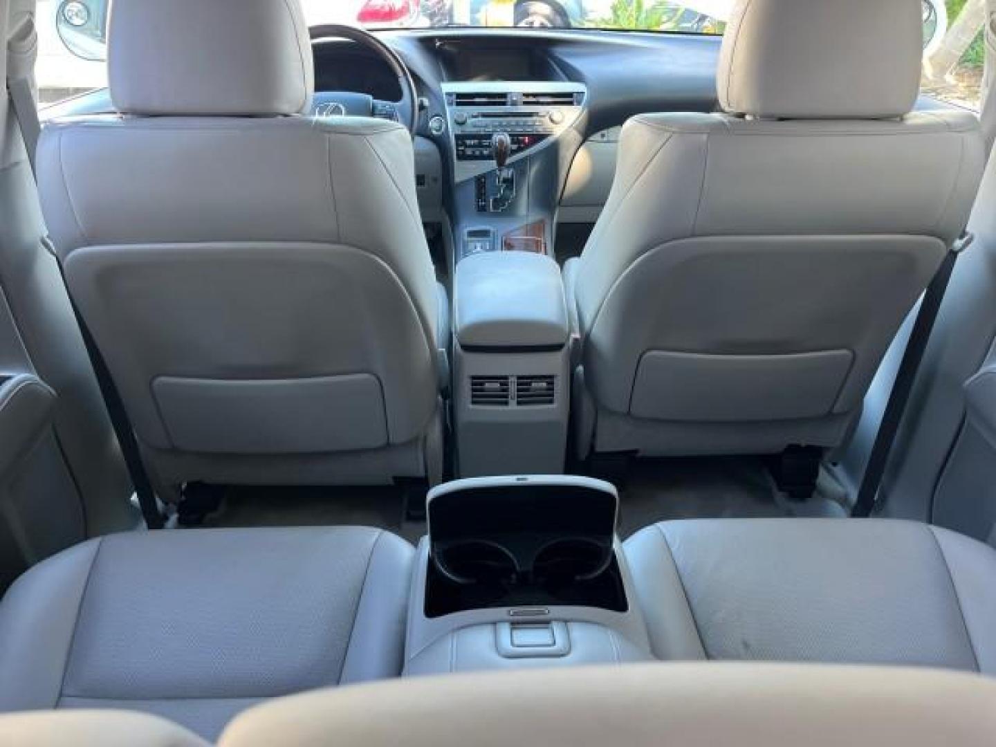 2010 Starfire Pearl /Parchment Lexus RX 350 1 FL LOW MILES 65,074 (JTJZK1BA1A2) with an 3.5L DOHC SFI 24-Valve V6 Engine engine, Automatic transmission, located at 4701 North Dixie Hwy, Pompano Beach, FL, 33064, (954) 422-2889, 26.240938, -80.123474 - OUR WEBPAGE FLORIDACARS1.COM HAS OVER 100 PHOTOS AND FREE CARFAX LINK 2010 LEXUS RX 350 ROAD READY 3.5L V6 VIN: JTJZK1BA1A2403467 NO ACCIDENTS NO RECALLS 4 DOOR WAGON/SPORT UTILITY 1 OWNER FLORIDA 25 MPG 3.5L V6 F DOHC 24V NEW $ 50,360 LOW MILES 65,077 GASOLINE BACK UP CAMERA POWER SUNROOF/LIFTGATE - Photo#70