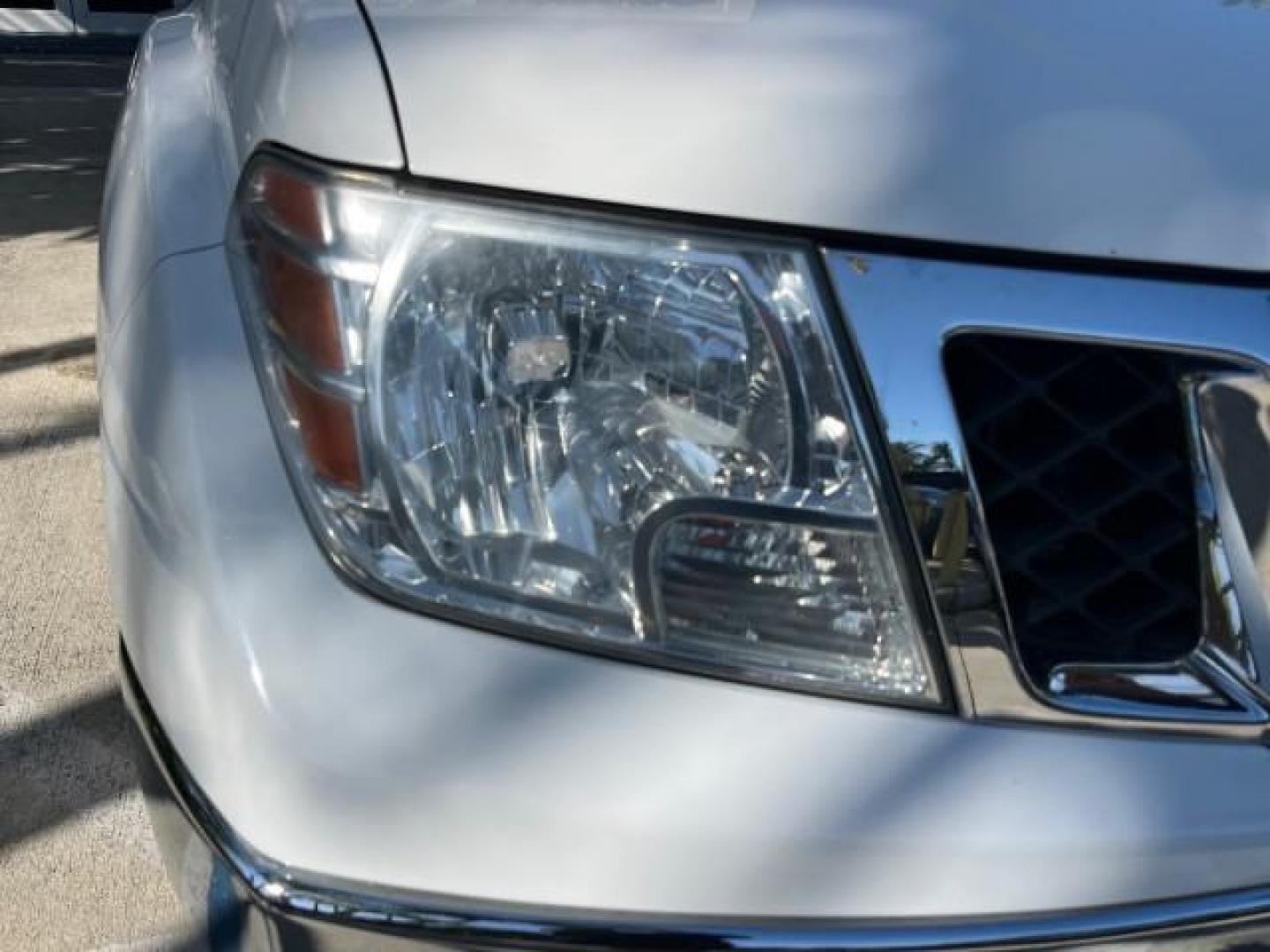 2009 Avalanche White /Graphite Nissan Frontier 4 DR SE LOW MILES 75,093 (1N6AD07U19C) with an 4.0L V6 Cylinder Engine engine, Automatic transmission, located at 4701 North Dixie Hwy, Pompano Beach, FL, 33064, (954) 422-2889, 26.240938, -80.123474 - OUR WEBPAGE FLORIDACARS1.COM HAS OVER 100 PHOTOS AND FREE CARFAX LINK 2009 NISSAN FRONTIER LE ROAD READY 4.0L V6 VIN: 1N6AD07U19C402507 FLORIDA OWNER CREW PICKUP LOW MILES 75,093 4.0L V6 F DOHC 24V POWER SUNROOF GASOLINE 16 SERVICE RECORDS REAR WHEEL DRIVE VERY CLEAN 5.0FT BED LENGHT 4X2 5.0' Bed Le - Photo#85