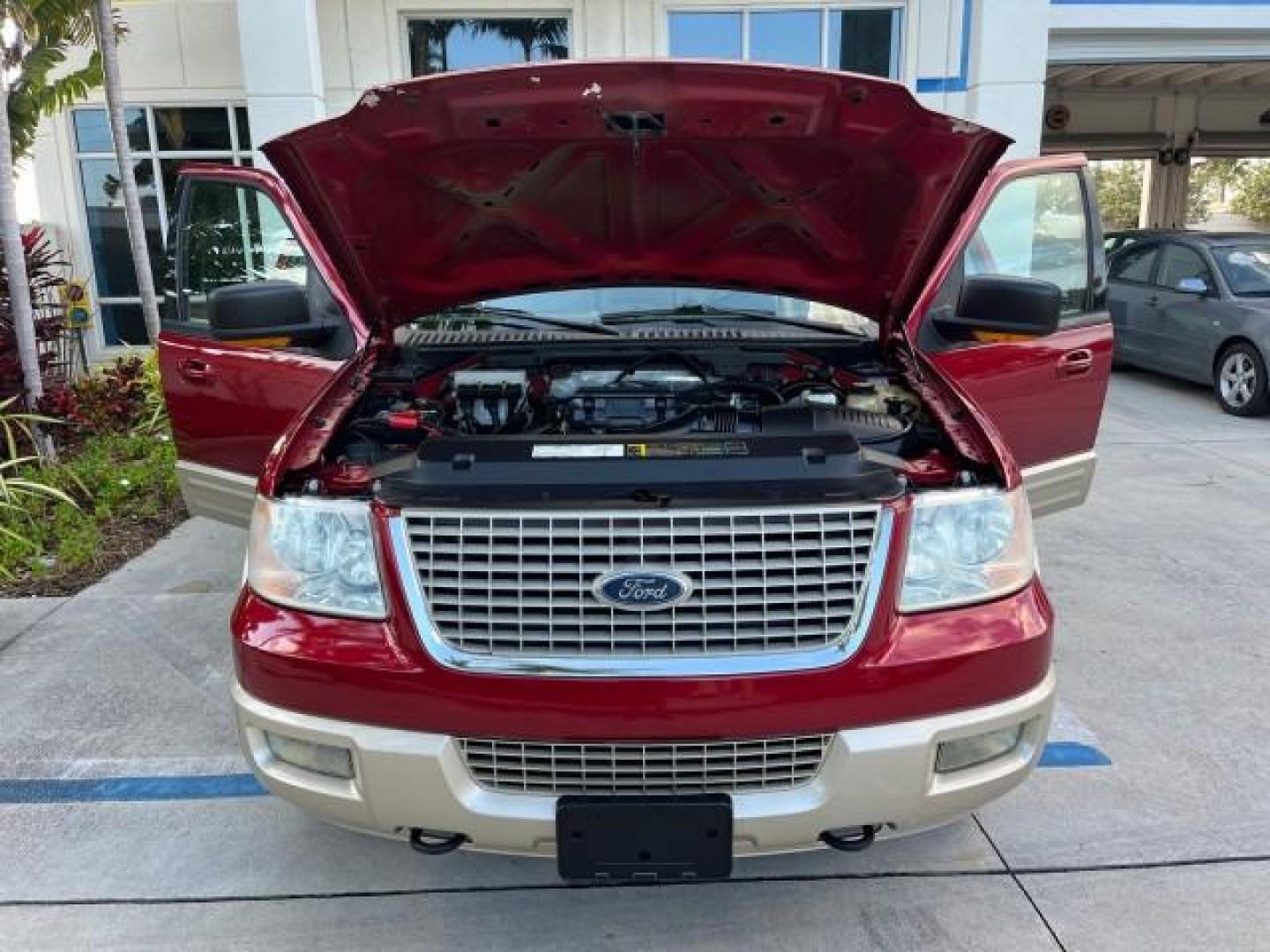 2006 Redfire Metallic /Medium Parchment Ford Expedition 4WD Eddie Bauer LOW MILES 73,326 (1FMFU18586L) with an 5.4L SOHC SEFI 24-Valve V8 Engine engine, Automatic transmission, located at 4701 North Dixie Hwy, Pompano Beach, FL, 33064, (954) 422-2889, 26.240938, -80.123474 - OUR WEBPAGE FLORIDACARS1.COM HAS OVER 100 PHOTOS AND FREE CARFAX LINK 2006 FORD EXPEDITION EDDIE BAUER ROAD READY 5.4L V8 VIN: 1FMFU18586LA99593 NO ACCIDENTS 4X4 4 DOOR WAGON/SPORT UTILITY NO RECALLS FL OWNER 5.4L V8 F SOHC 3 ROW LEATHER SEATS GASOLINE 4WD ON DEMAND REAR WHEEL DRIVE W/ 4X4 PARK SENS - Photo#16