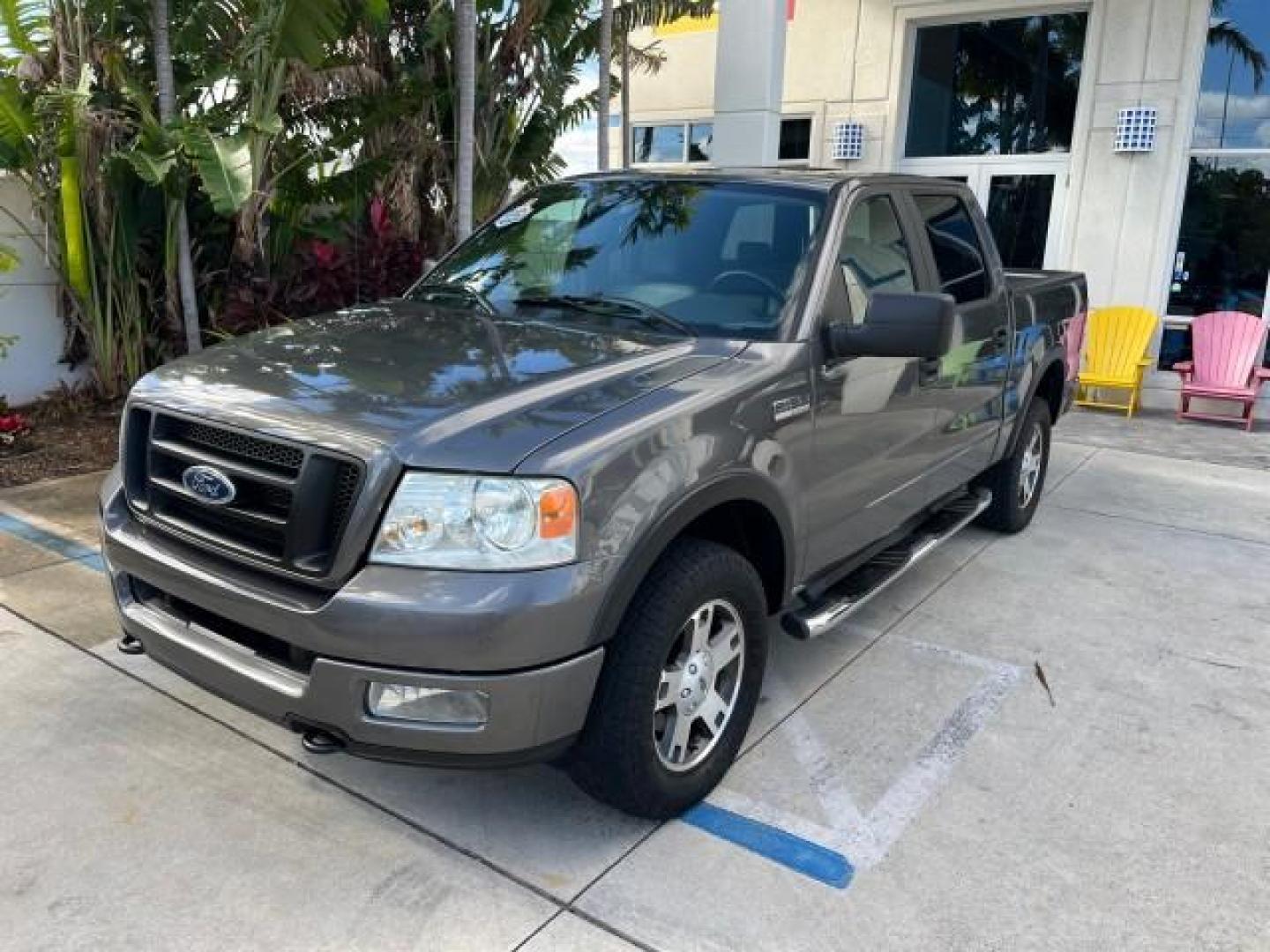 2005 Dark Shadow Grey Metallic /Black Ford F-150 1 FL FX4 4X4 LOW MILES 80,488 (1FTPW14535K) with an 5.4L 3v EFI V8 Engine engine, Automatic transmission, located at 4701 North Dixie Hwy, Pompano Beach, FL, 33064, (954) 422-2889, 26.240938, -80.123474 - OUR WEBPAGE FLORIDACARS1.COM HAS OVER 100 PHOTOS AND FREE CARFAX LINK 2005 FORD F-150 XLT ROAD READY 5.4L V8 VIN: 1FTPW14535KE86307 FX4 NO ACCIDENTS 4X4 CREW PICKUP BLUETOOTH NAVI NO RECALLS 1 OWNER FL 5.4L V8 F SOHC POWER SUNROOF 5,6FT BED LENGTH GASOLINE POWER LEATHER SEATS LOW MILES 80,488 REAR W - Photo#75