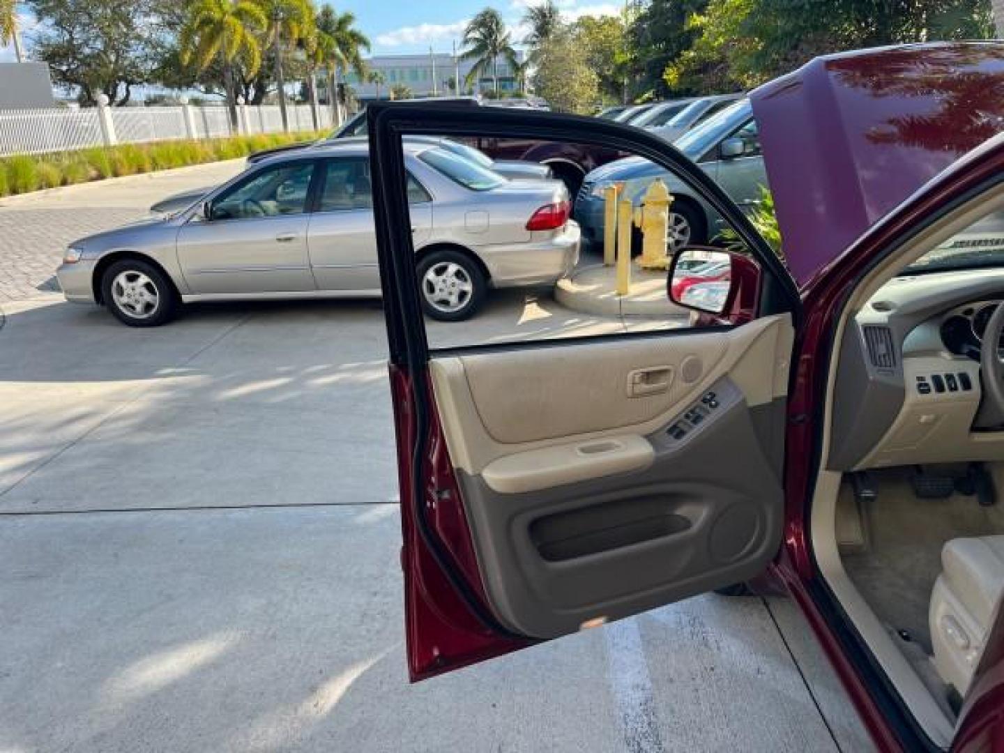 2005 Salsa Red Pearl /Ivory Toyota Highlander AWD 4X4 LOW MILES 89,214 (JTEEP21A350) with an 3.3L DOHC SFI 24-Valve VVT-i V6 Engine engine, Automatic transmission, located at 4701 North Dixie Hwy, Pompano Beach, FL, 33064, (954) 422-2889, 26.240938, -80.123474 - OUR WEBPAGE FLORIDACARS1.COM HAS OVER 100 PHOTOS AND FREE CARFAX LINK 2005 TOYOTA HIGHLANDER ROAD READY 3.3L V6 VIN: JTEEP21A350104294 NO ACCIDENTS 4 DOOR WAGON/SPORT UTILITY ALL WHEEL DRIVE 3.3L V6 F DOHC 24V NO RECALLS GASOLINE 16 SERVICE RECORDS FLORIDA OWNER ALL WHEEL DRIVE LOW MILES 89,214 POWE - Photo#9