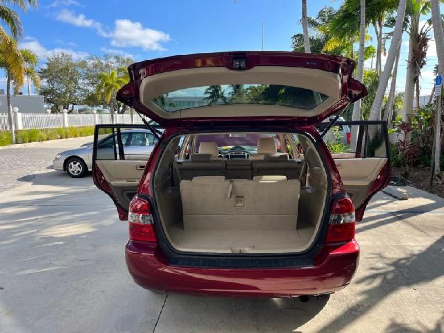 2005 Salsa Red Pearl /Ivory Toyota Highlander AWD 4X4 LOW MILES 89,214 (JTEEP21A350) with an 3.3L DOHC SFI 24-Valve VVT-i V6 Engine engine, Automatic transmission, located at 4701 North Dixie Hwy, Pompano Beach, FL, 33064, (954) 422-2889, 26.240938, -80.123474 - OUR WEBPAGE FLORIDACARS1.COM HAS OVER 100 PHOTOS AND FREE CARFAX LINK 2005 TOYOTA HIGHLANDER ROAD READY 3.3L V6 VIN: JTEEP21A350104294 NO ACCIDENTS 4 DOOR WAGON/SPORT UTILITY ALL WHEEL DRIVE 3.3L V6 F DOHC 24V NO RECALLS GASOLINE 16 SERVICE RECORDS FLORIDA OWNER ALL WHEEL DRIVE LOW MILES 89,214 POWE - Photo#15