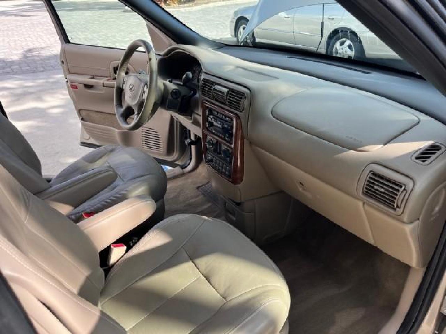 2002 Bronzemist /Gray Oldsmobile Silhouette GLS 1 OWNER FL LOW MILES 71860 (1GHDX03E72D) with an 3.4L SFI V6 Transverse-Mounted Engine engine, Automatic transmission, located at 4701 North Dixie Hwy, Pompano Beach, FL, 33064, (954) 422-2889, 26.240938, -80.123474 - OUR WEBPAGE FLORIDACARS1.COM HAS OVER 100 PHOTOS AND FREE CARFAX LINK 2002 OLDSMOBILE SILHOUETTE GLS ROAD READY 3.4L V6 VIN: 1GHDX03E72D308650 NO ACCIDENTS NO RECALLS VAN 1 OWNER FLORIDA DUAL AC 3.4L V6 F POWER SEATS/MIRRORS LOW MILES 71,860 GASOLINE BACK UP SENSORS POWER SLIDING DOORS FRONT WHEEL D - Photo#29