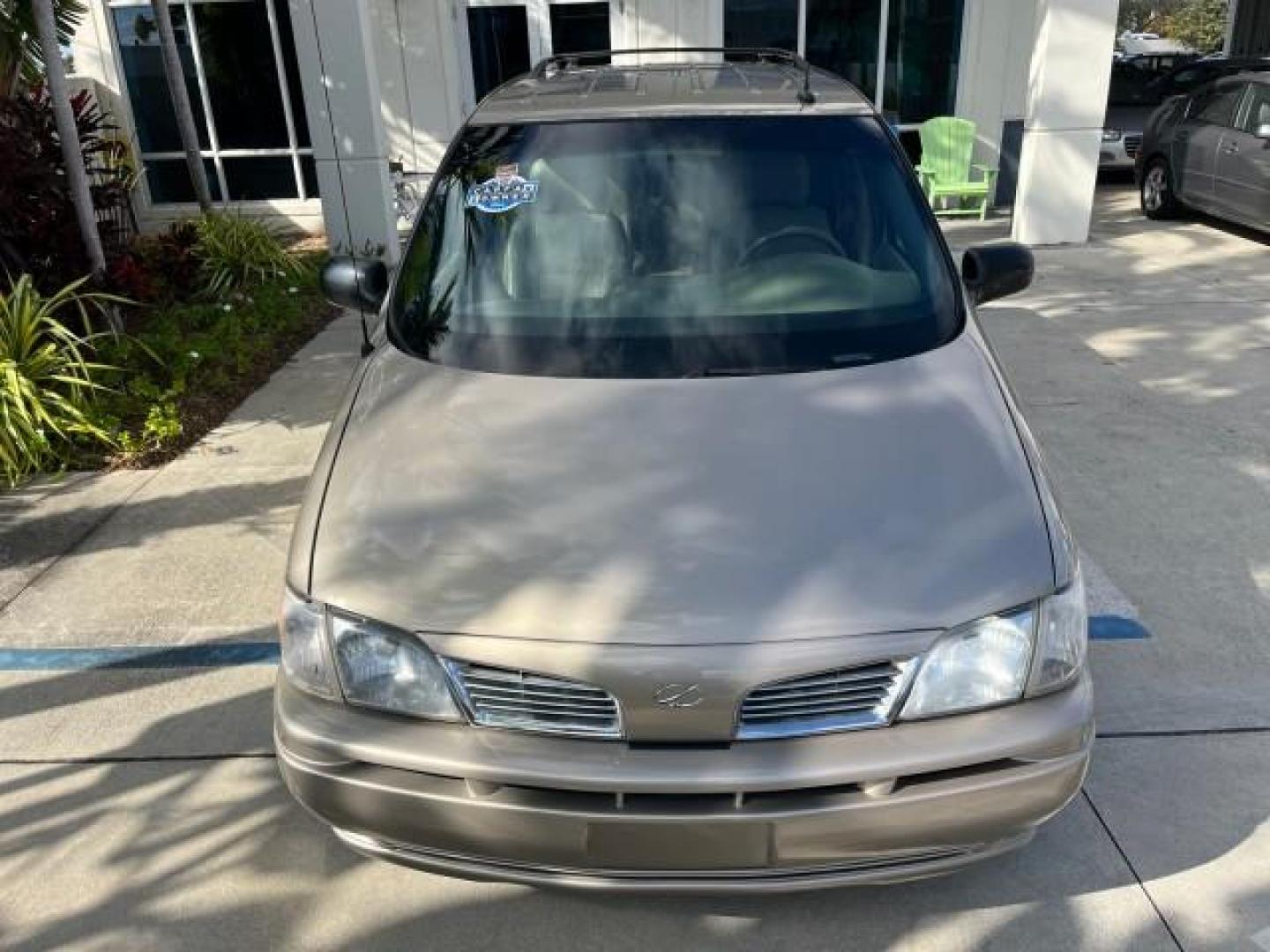 2002 Bronzemist /Gray Oldsmobile Silhouette GLS 1 OWNER FL LOW MILES 71860 (1GHDX03E72D) with an 3.4L SFI V6 Transverse-Mounted Engine engine, Automatic transmission, located at 4701 North Dixie Hwy, Pompano Beach, FL, 33064, (954) 422-2889, 26.240938, -80.123474 - OUR WEBPAGE FLORIDACARS1.COM HAS OVER 100 PHOTOS AND FREE CARFAX LINK 2002 OLDSMOBILE SILHOUETTE GLS ROAD READY 3.4L V6 VIN: 1GHDX03E72D308650 NO ACCIDENTS NO RECALLS VAN 1 OWNER FLORIDA DUAL AC 3.4L V6 F POWER SEATS/MIRRORS LOW MILES 71,860 GASOLINE BACK UP SENSORS POWER SLIDING DOORS FRONT WHEEL D - Photo#98