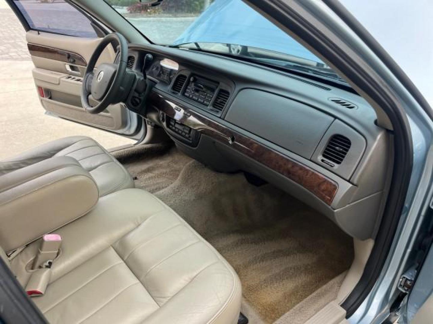 2009 Norsea Blue Metallic /Medium light stone Mercury Grand Marquis ULTIMATE LS LOW MILES 46,388 (2MEHM75V09X) with an 4.6L OHC SEFI FFV V8 Engine engine, Automatic transmission, located at 4701 North Dixie Hwy, Pompano Beach, FL, 33064, (954) 422-2889, 26.240938, -80.123474 - OUR WEBPAGE FLORIDACARS1.COM HAS OVER 100 PHOTOS AND FREE CARFAX LINK 2009 MERCURY GRAND MARQUIS LS ULTIMATE ROAD READY 4.6L V8 VIN: 2MEHM75V09X627301 NO ACCIDENTS SEDAN 4 DR NO RECALLS 4.6L V8 F SOHC 16V FLORIDA OWNER FLEX FUEL POWER LEATHER SEATS REAR WHEEL DRIVE LOW MILES 46,388 Adaptive Headligh - Photo#26