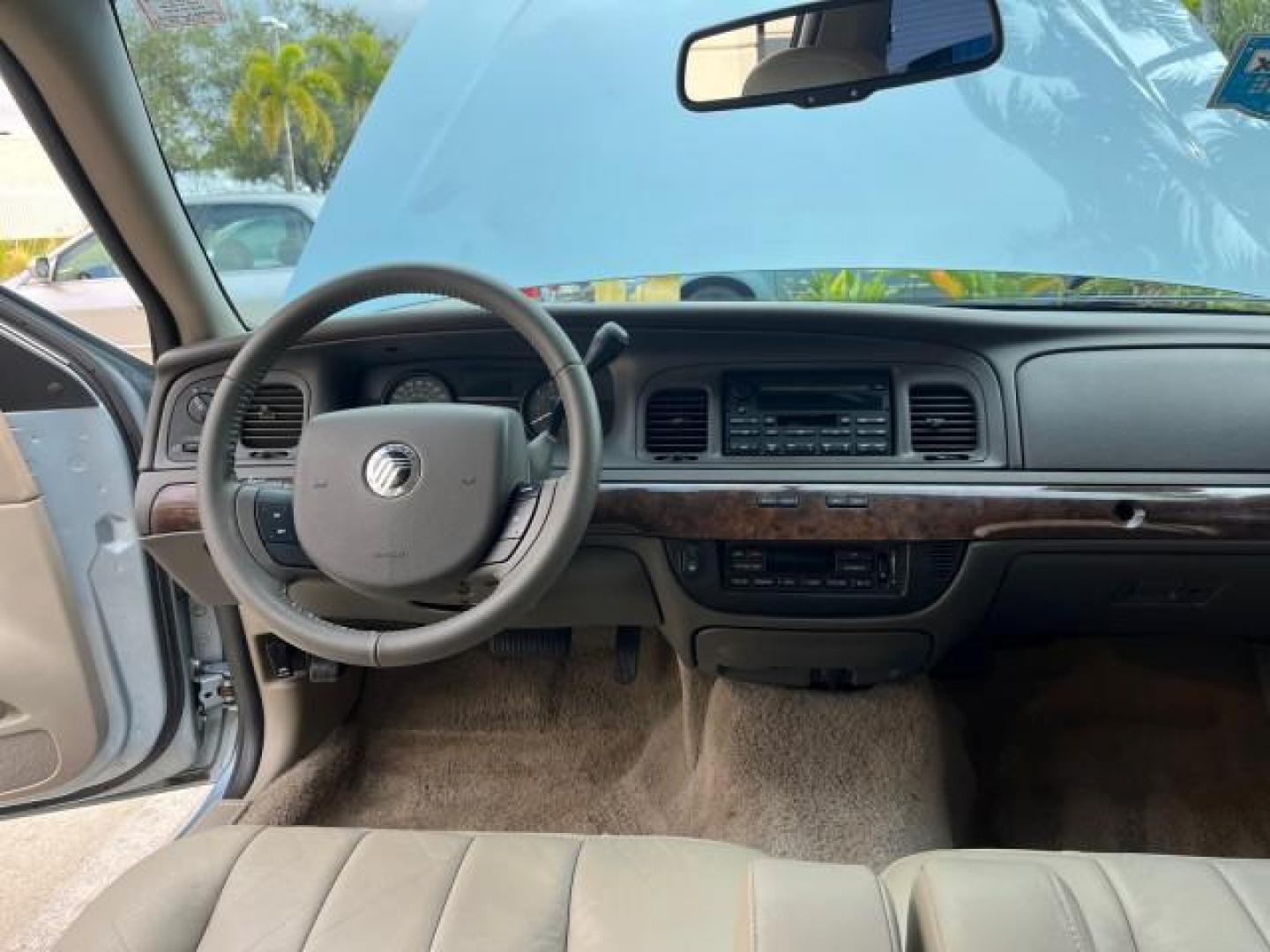 2009 Norsea Blue Metallic /Medium light stone Mercury Grand Marquis ULTIMATE LS LOW MILES 46,388 (2MEHM75V09X) with an 4.6L OHC SEFI FFV V8 Engine engine, Automatic transmission, located at 4701 North Dixie Hwy, Pompano Beach, FL, 33064, (954) 422-2889, 26.240938, -80.123474 - OUR WEBPAGE FLORIDACARS1.COM HAS OVER 100 PHOTOS AND FREE CARFAX LINK 2009 MERCURY GRAND MARQUIS LS ULTIMATE ROAD READY 4.6L V8 VIN: 2MEHM75V09X627301 NO ACCIDENTS SEDAN 4 DR NO RECALLS 4.6L V8 F SOHC 16V FLORIDA OWNER FLEX FUEL POWER LEATHER SEATS REAR WHEEL DRIVE LOW MILES 46,388 Adaptive Headligh - Photo#33