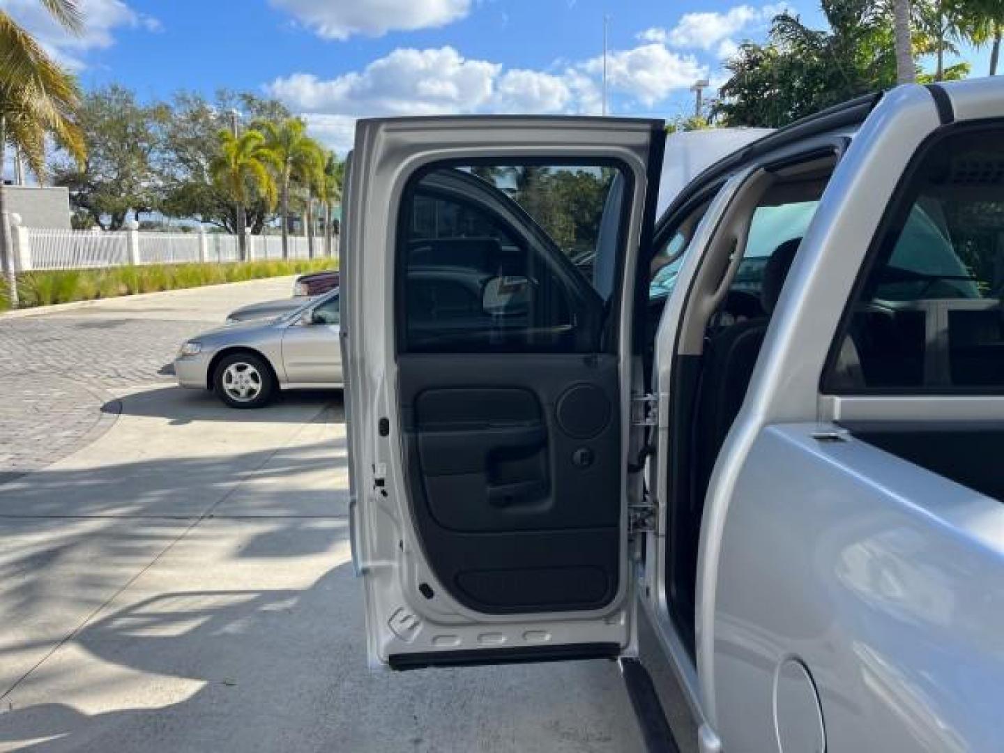 2003 Bright Silver Metallic /Dark Slate Gray Dodge Ram 1500 CREW HEMI SLT LOW MILES 78,951 (1D7HA18D13S) with an 5.7L V8 Hemi Magnum Engine engine, Automatic transmission, located at 4701 North Dixie Hwy, Pompano Beach, FL, 33064, (954) 422-2889, 26.240938, -80.123474 - OUR WEBPAGE FLORIDACARS1.COM HAS OVER 100 PHOTOS AND FREE CARFAX LINK 2003 DODGE RAM 1500 SLT ROAD READY 5.7L V8 VIN: 1D7HA18D13S364293 NO RECALLS 4 DOOR EXTENDED CAB PICKUP FLORIDA OWNER 5.7L V8 F LOW MILES 78,951 GASOLINE POWER SEATS REAR WHEEL DRIVE 6.4FT BED LENGHT Approach Lights Chrome Wheels - Photo#13