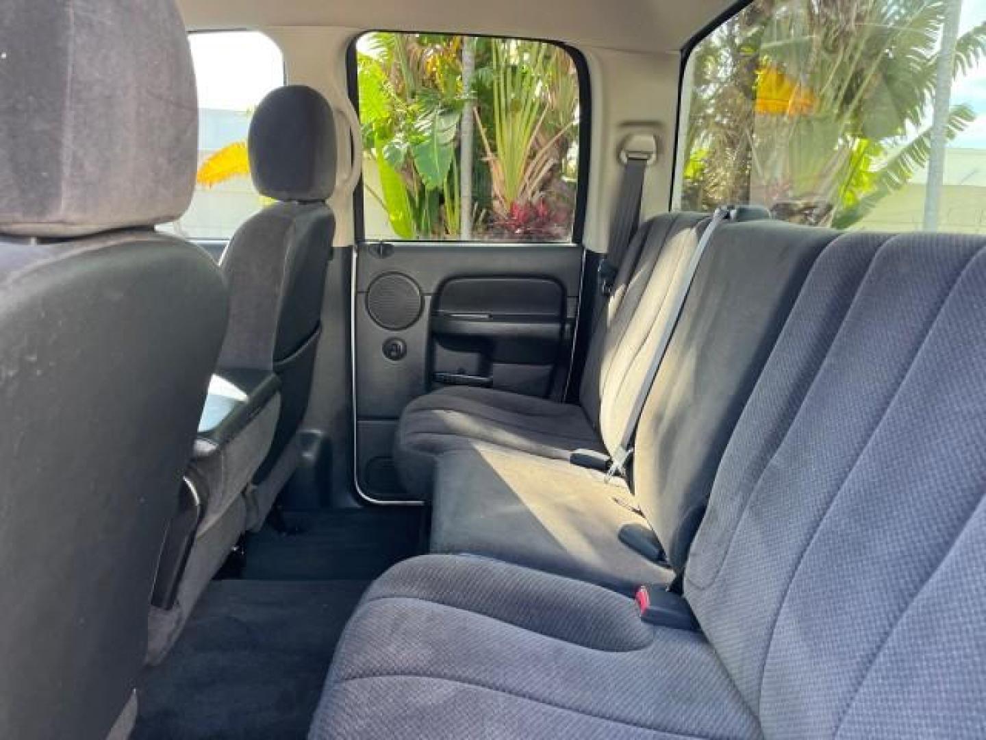 2003 Bright Silver Metallic /Dark Slate Gray Dodge Ram 1500 CREW HEMI SLT LOW MILES 78,951 (1D7HA18D13S) with an 5.7L V8 Hemi Magnum Engine engine, Automatic transmission, located at 4701 North Dixie Hwy, Pompano Beach, FL, 33064, (954) 422-2889, 26.240938, -80.123474 - OUR WEBPAGE FLORIDACARS1.COM HAS OVER 100 PHOTOS AND FREE CARFAX LINK 2003 DODGE RAM 1500 SLT ROAD READY 5.7L V8 VIN: 1D7HA18D13S364293 NO RECALLS 4 DOOR EXTENDED CAB PICKUP FLORIDA OWNER 5.7L V8 F LOW MILES 78,951 GASOLINE POWER SEATS REAR WHEEL DRIVE 6.4FT BED LENGHT Approach Lights Chrome Wheels - Photo#39