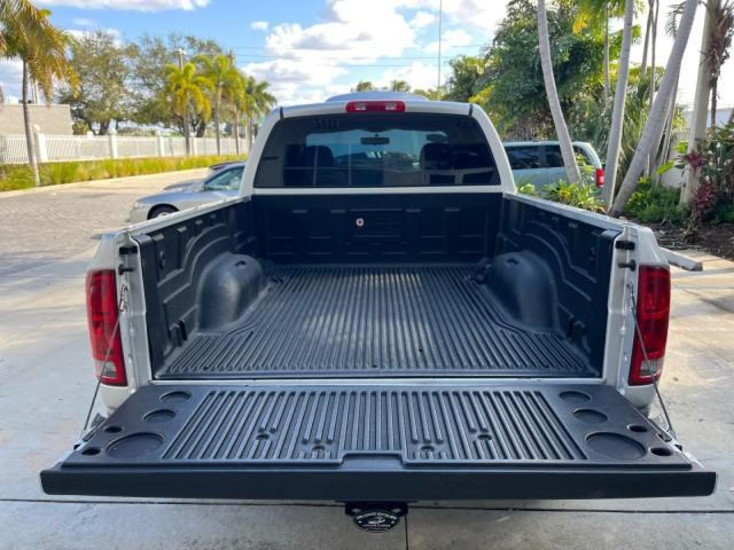 2003 Bright Silver Metallic /Dark Slate Gray Dodge Ram 1500 CREW HEMI SLT LOW MILES 78,951 (1D7HA18D13S) with an 5.7L V8 Hemi Magnum Engine engine, Automatic transmission, located at 4701 North Dixie Hwy, Pompano Beach, FL, 33064, (954) 422-2889, 26.240938, -80.123474 - OUR WEBPAGE FLORIDACARS1.COM HAS OVER 100 PHOTOS AND FREE CARFAX LINK 2003 DODGE RAM 1500 SLT ROAD READY 5.7L V8 VIN: 1D7HA18D13S364293 NO RECALLS 4 DOOR EXTENDED CAB PICKUP FLORIDA OWNER 5.7L V8 F LOW MILES 78,951 GASOLINE POWER SEATS REAR WHEEL DRIVE 6.4FT BED LENGHT Approach Lights Chrome Wheels - Photo#58