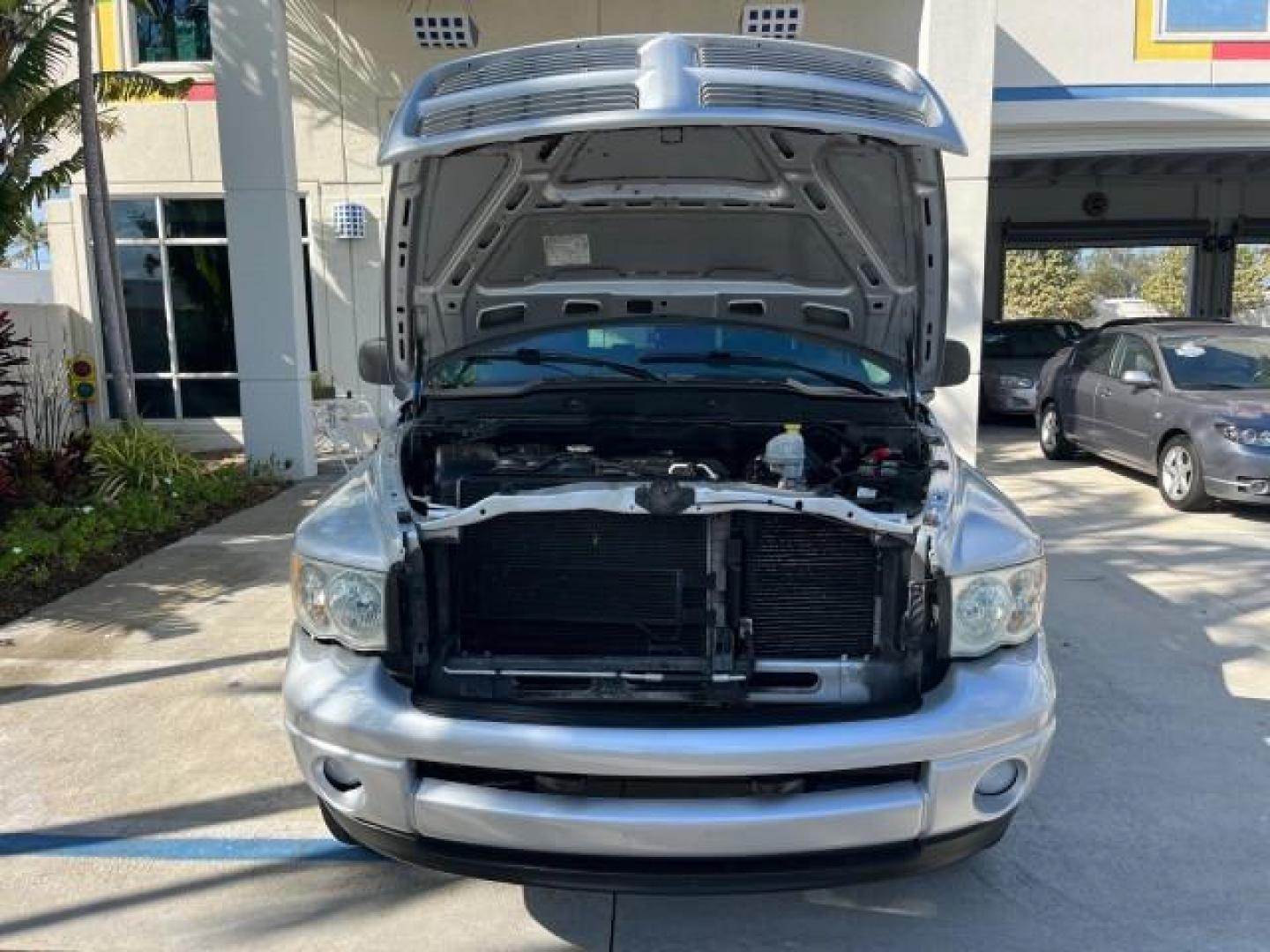 2003 Bright Silver Metallic /Dark Slate Gray Dodge Ram 1500 CREW HEMI SLT LOW MILES 78,951 (1D7HA18D13S) with an 5.7L V8 Hemi Magnum Engine engine, Automatic transmission, located at 4701 North Dixie Hwy, Pompano Beach, FL, 33064, (954) 422-2889, 26.240938, -80.123474 - OUR WEBPAGE FLORIDACARS1.COM HAS OVER 100 PHOTOS AND FREE CARFAX LINK 2003 DODGE RAM 1500 SLT ROAD READY 5.7L V8 VIN: 1D7HA18D13S364293 NO RECALLS 4 DOOR EXTENDED CAB PICKUP FLORIDA OWNER 5.7L V8 F LOW MILES 78,951 GASOLINE POWER SEATS REAR WHEEL DRIVE 6.4FT BED LENGHT Approach Lights Chrome Wheels - Photo#61