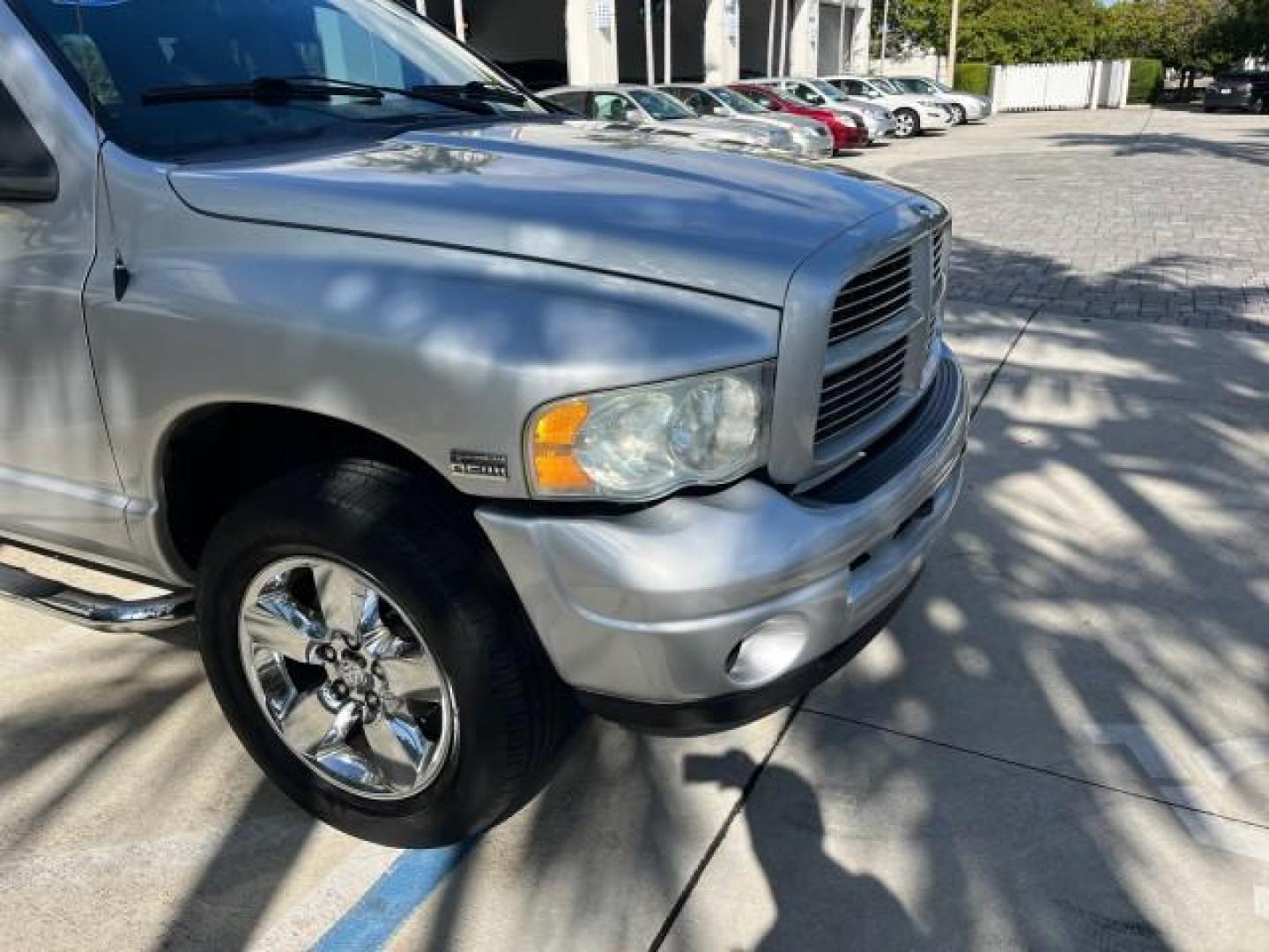 2003 Bright Silver Metallic /Dark Slate Gray Dodge Ram 1500 CREW HEMI SLT LOW MILES 78,951 (1D7HA18D13S) with an 5.7L V8 Hemi Magnum Engine engine, Automatic transmission, located at 4701 North Dixie Hwy, Pompano Beach, FL, 33064, (954) 422-2889, 26.240938, -80.123474 - OUR WEBPAGE FLORIDACARS1.COM HAS OVER 100 PHOTOS AND FREE CARFAX LINK 2003 DODGE RAM 1500 SLT ROAD READY 5.7L V8 VIN: 1D7HA18D13S364293 NO RECALLS 4 DOOR EXTENDED CAB PICKUP FLORIDA OWNER 5.7L V8 F LOW MILES 78,951 GASOLINE POWER SEATS REAR WHEEL DRIVE 6.4FT BED LENGHT Approach Lights Chrome Wheels - Photo#76