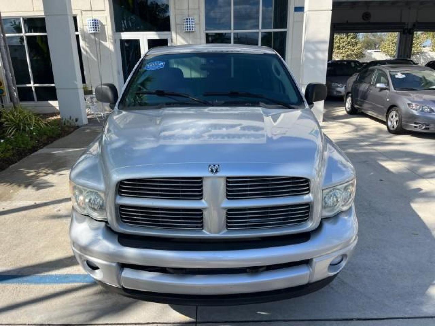 2003 Bright Silver Metallic /Dark Slate Gray Dodge Ram 1500 CREW HEMI SLT LOW MILES 78,951 (1D7HA18D13S) with an 5.7L V8 Hemi Magnum Engine engine, Automatic transmission, located at 4701 North Dixie Hwy, Pompano Beach, FL, 33064, (954) 422-2889, 26.240938, -80.123474 - OUR WEBPAGE FLORIDACARS1.COM HAS OVER 100 PHOTOS AND FREE CARFAX LINK 2003 DODGE RAM 1500 SLT ROAD READY 5.7L V8 VIN: 1D7HA18D13S364293 NO RECALLS 4 DOOR EXTENDED CAB PICKUP FLORIDA OWNER 5.7L V8 F LOW MILES 78,951 GASOLINE POWER SEATS REAR WHEEL DRIVE 6.4FT BED LENGHT Approach Lights Chrome Wheels - Photo#78