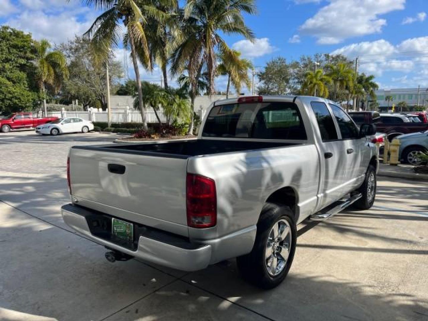 2003 Bright Silver Metallic /Dark Slate Gray Dodge Ram 1500 CREW HEMI SLT LOW MILES 78,951 (1D7HA18D13S) with an 5.7L V8 Hemi Magnum Engine engine, Automatic transmission, located at 4701 North Dixie Hwy, Pompano Beach, FL, 33064, (954) 422-2889, 26.240938, -80.123474 - OUR WEBPAGE FLORIDACARS1.COM HAS OVER 100 PHOTOS AND FREE CARFAX LINK 2003 DODGE RAM 1500 SLT ROAD READY 5.7L V8 VIN: 1D7HA18D13S364293 NO RECALLS 4 DOOR EXTENDED CAB PICKUP FLORIDA OWNER 5.7L V8 F LOW MILES 78,951 GASOLINE POWER SEATS REAR WHEEL DRIVE 6.4FT BED LENGHT Approach Lights Chrome Wheels - Photo#7