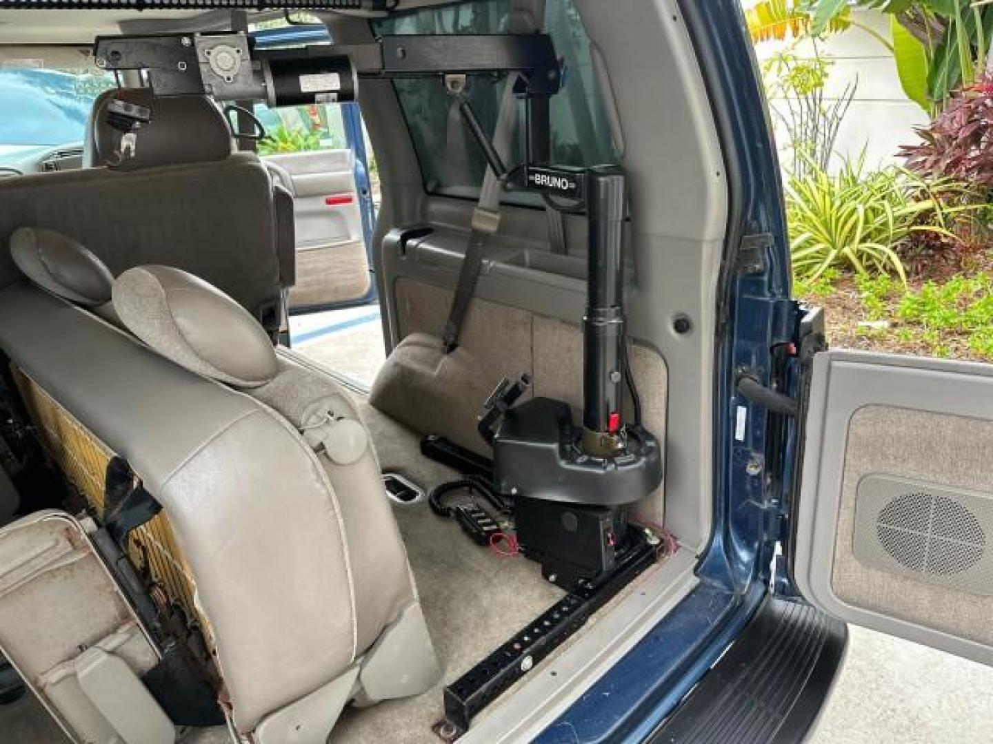 2005 Medium Cadet Blue Metallic /Medium Gray Chevrolet Astro Passenger AWD LOW MILES 68,902 1 OWNER (1GNEL19X35B) with an 4.3L Vortec 4300 V6 MFI Engine engine, Automatic transmission, located at 4701 North Dixie Hwy, Pompano Beach, FL, 33064, (954) 422-2889, 26.240938, -80.123474 - OUR WEBPAGE FLORIDACARS1.COM HAS 100 PHOTOS AND FREE CARFAX LINK 2005 CHEVROLET ASTRO 7 PASSENGER VIN: 1GNEL19X35B105007 VAN 4.3L V6 F GASOLINE HANDICAP LIFT ALL WHEEL DRIVE AWD Automatic Climate Control Cruise Control Front Bucket Seats Limited Slip Differential Rear Privacy Glass Trailer Wiring TH - Photo#16