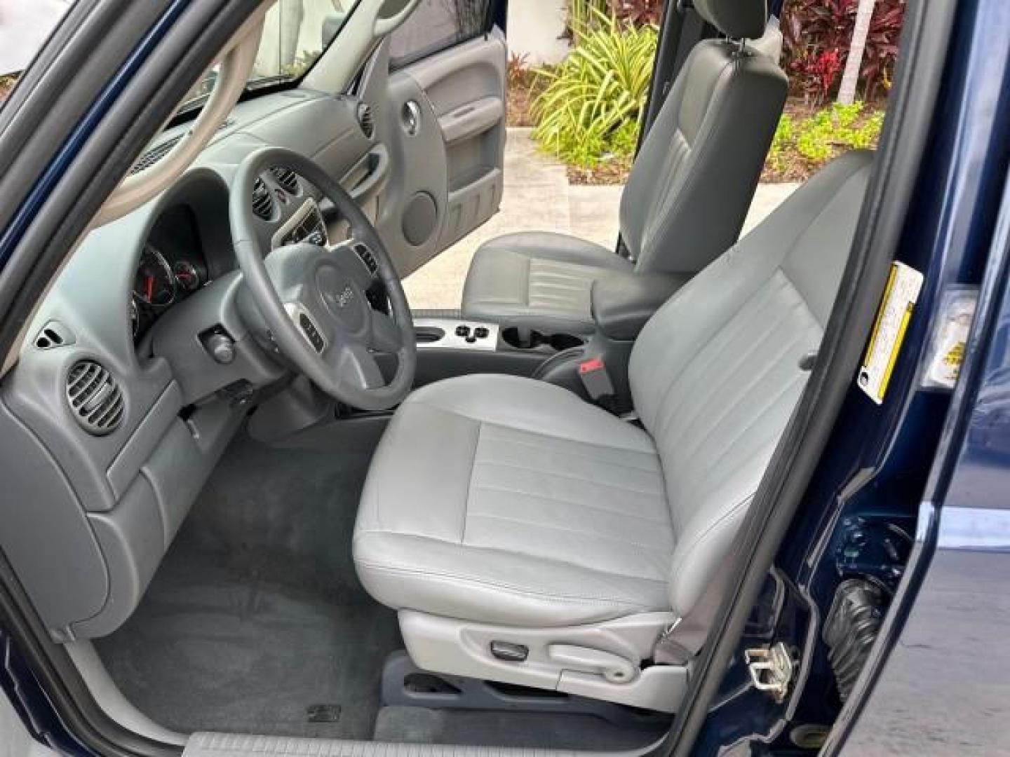 2006 Patriot Blue Pearl /Med Slate Gray Jeep Liberty Limited 4WD LOW MILES 78,641 (1J4GL58K96W) with an 3.7L V6 Engine engine, Automatic transmission, located at 4701 North Dixie Hwy, Pompano Beach, FL, 33064, (954) 422-2889, 26.240938, -80.123474 - OUR WEBPAGE FLORIDACARS1.COM HAS OVER 100 PHOTOS AND FREE CARFAX LINK 2006 JEEP LIBERTY LIMITED VIN: 1J4GL58K96W271518 4 DOOR WAGON/SPORT UTILITY 3.7L V6 F GASOLINE REAR WHEEL DRIVE W/ 4X4 4WD/AWD Alloy Wheels Leather Seats THIS IS ONE OF THE NICEST JEEPS WE HAVE EVER LISTED,2 OWNER FLORIDA TITLE. B - Photo#12