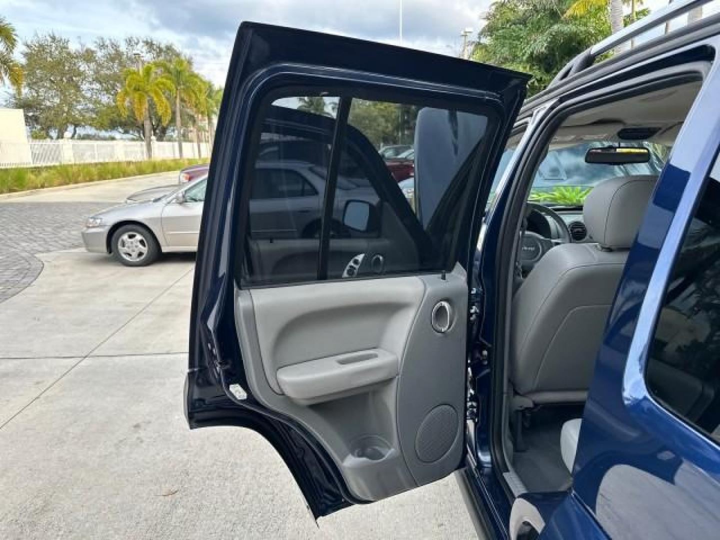 2006 Patriot Blue Pearl /Med Slate Gray Jeep Liberty Limited 4WD LOW MILES 78,641 (1J4GL58K96W) with an 3.7L V6 Engine engine, Automatic transmission, located at 4701 North Dixie Hwy, Pompano Beach, FL, 33064, (954) 422-2889, 26.240938, -80.123474 - OUR WEBPAGE FLORIDACARS1.COM HAS OVER 100 PHOTOS AND FREE CARFAX LINK 2006 JEEP LIBERTY LIMITED VIN: 1J4GL58K96W271518 4 DOOR WAGON/SPORT UTILITY 3.7L V6 F GASOLINE REAR WHEEL DRIVE W/ 4X4 4WD/AWD Alloy Wheels Leather Seats THIS IS ONE OF THE NICEST JEEPS WE HAVE EVER LISTED,2 OWNER FLORIDA TITLE. B - Photo#13