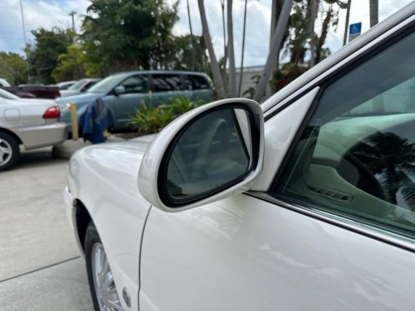 2005 White Opal /Light Cashmere Buick LeSabre NON SMOKERS Low Miles 45,864 (1G4HP52K25U) with an 3.8L 3800 V6 SFI Engine engine, Automatic transmission, located at 4701 North Dixie Hwy, Pompano Beach, FL, 33064, (954) 422-2889, 26.240938, -80.123474 - OUR WEBPAGE FLORIDACARS1.COM HAS OVER 100 PHOTOS AND FREE CARFAX LINK 2005 Buick LeSabre Custom $ 29,270 new ! VIN: 1G4HP52K25U249602 SEDAN 4 DR 3.8L V6 F OHV GASOLINE 29 MPG FRONT WHEEL DRIVE ABS Brakes CD Audio Power Mirrors Side Airbags AM/FM Stereo Cassette Player Power Seat(s) Smart Key Air Con - Photo#34