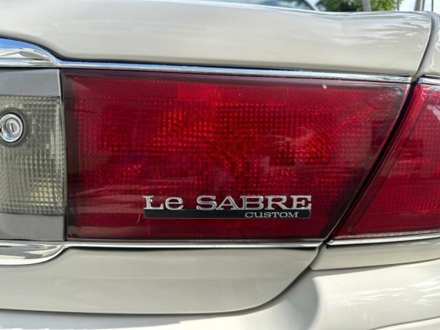 2005 White Opal /Light Cashmere Buick LeSabre NON SMOKERS Low Miles 45,864 (1G4HP52K25U) with an 3.8L 3800 V6 SFI Engine engine, Automatic transmission, located at 4701 North Dixie Hwy, Pompano Beach, FL, 33064, (954) 422-2889, 26.240938, -80.123474 - OUR WEBPAGE FLORIDACARS1.COM HAS OVER 100 PHOTOS AND FREE CARFAX LINK 2005 Buick LeSabre Custom $ 29,270 new ! VIN: 1G4HP52K25U249602 SEDAN 4 DR 3.8L V6 F OHV GASOLINE 29 MPG FRONT WHEEL DRIVE ABS Brakes CD Audio Power Mirrors Side Airbags AM/FM Stereo Cassette Player Power Seat(s) Smart Key Air Con - Photo#88