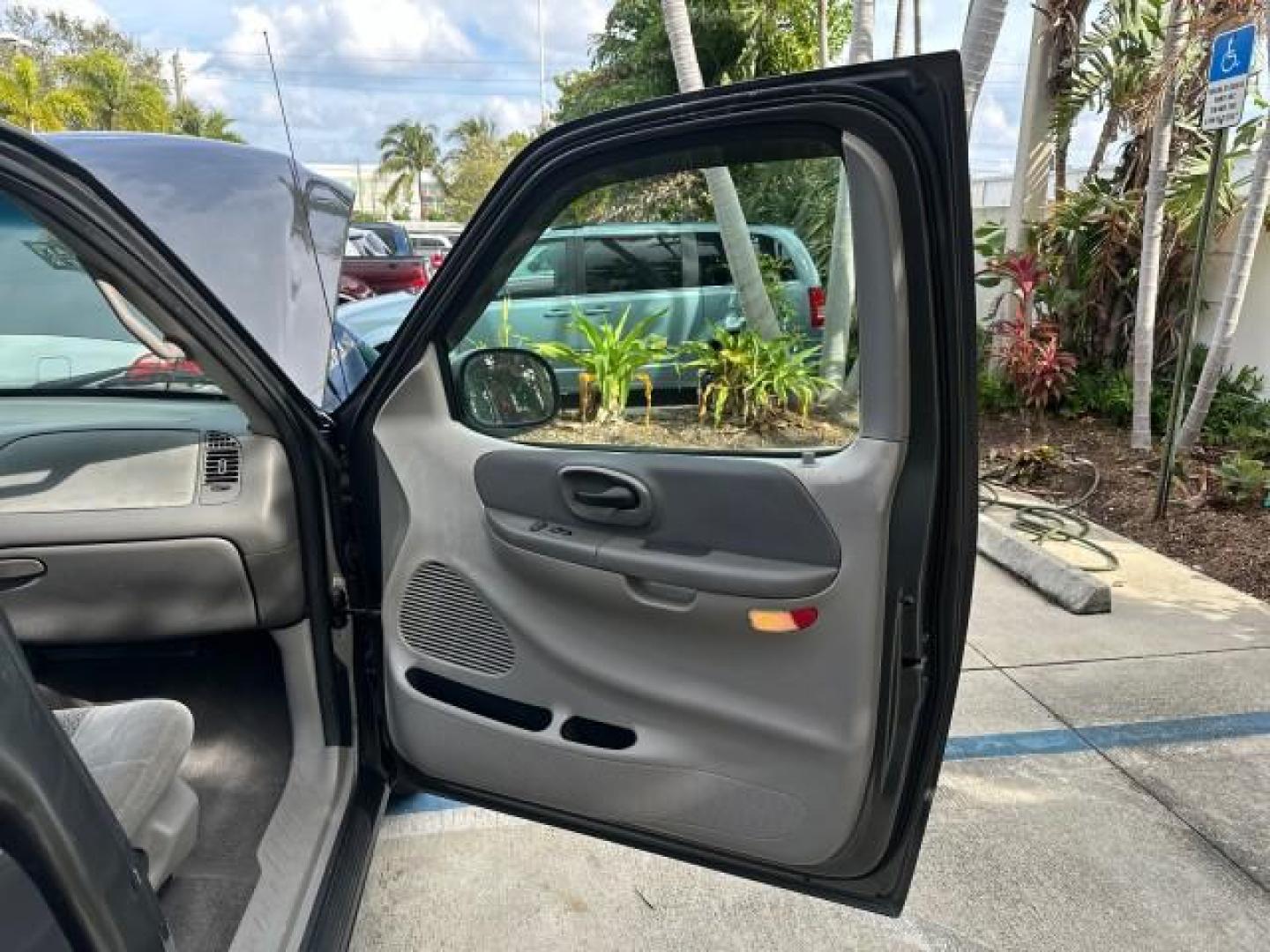 2002 Dark Shadow Grey Metallic /Medium Graphite Ford F-150 XL LOW MILES 56,147 AC (1FTRF17W82N) with an 4.6L SEFI OHC V8 Triton Engine engine, Automatic transmission, located at 4701 North Dixie Hwy, Pompano Beach, FL, 33064, (954) 422-2889, 26.240938, -80.123474 - OUR WEBPAGE FLORIDACARS1.COM HAS OVER 100 PHOTOS AND FREE CARFAX LINK 2002 FORD F-150 XL VIN: 1FTRF17W82NA79722 PICKUP 4.6L V8 F SOHC 16V GASOLINE REAR WHEEL DRIVE 8FT BED LINE-X Bed Liner Long Bed Cloth Seats Tow Hitch THIS IS ONE OF THE NICEST FORDS WE HAVE EVER LISTED, 1 OWNER! TRUCK HAS A 8FT BE - Photo#11