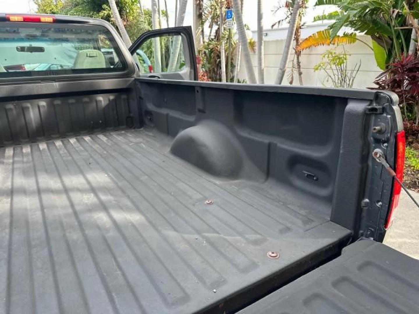 2002 Dark Shadow Grey Metallic /Medium Graphite Ford F-150 XL LOW MILES 56,147 AC (1FTRF17W82N) with an 4.6L SEFI OHC V8 Triton Engine engine, Automatic transmission, located at 4701 North Dixie Hwy, Pompano Beach, FL, 33064, (954) 422-2889, 26.240938, -80.123474 - OUR WEBPAGE FLORIDACARS1.COM HAS OVER 100 PHOTOS AND FREE CARFAX LINK 2002 FORD F-150 XL VIN: 1FTRF17W82NA79722 PICKUP 4.6L V8 F SOHC 16V GASOLINE REAR WHEEL DRIVE 8FT BED LINE-X Bed Liner Long Bed Cloth Seats Tow Hitch THIS IS ONE OF THE NICEST FORDS WE HAVE EVER LISTED, 1 OWNER! TRUCK HAS A 8FT BE - Photo#15