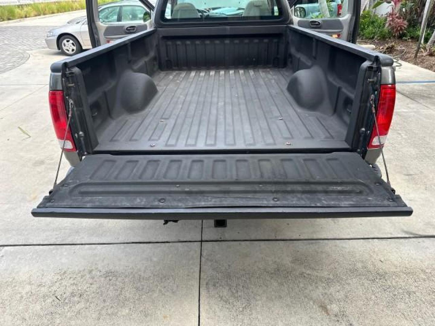 2002 Dark Shadow Grey Metallic /Medium Graphite Ford F-150 XL LOW MILES 56,147 AC (1FTRF17W82N) with an 4.6L SEFI OHC V8 Triton Engine engine, Automatic transmission, located at 4701 North Dixie Hwy, Pompano Beach, FL, 33064, (954) 422-2889, 26.240938, -80.123474 - OUR WEBPAGE FLORIDACARS1.COM HAS OVER 100 PHOTOS AND FREE CARFAX LINK 2002 FORD F-150 XL VIN: 1FTRF17W82NA79722 PICKUP 4.6L V8 F SOHC 16V GASOLINE REAR WHEEL DRIVE 8FT BED LINE-X Bed Liner Long Bed Cloth Seats Tow Hitch THIS IS ONE OF THE NICEST FORDS WE HAVE EVER LISTED, 1 OWNER! TRUCK HAS A 8FT BE - Photo#17