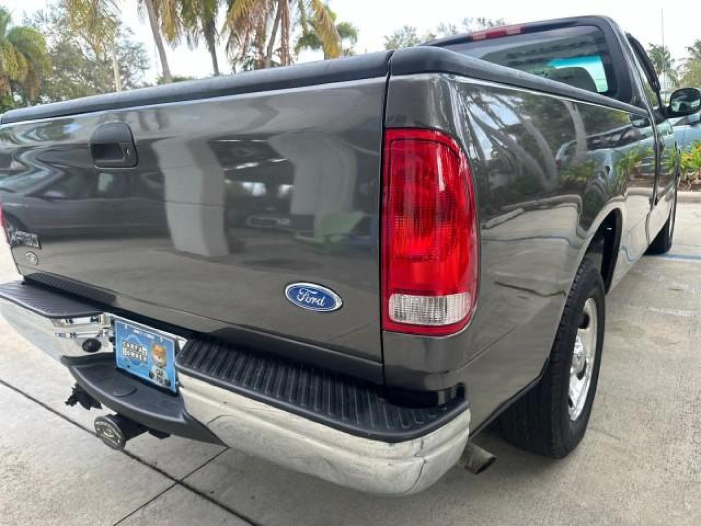 2002 Dark Shadow Grey Metallic /Medium Graphite Ford F-150 XL LOW MILES 56,147 AC (1FTRF17W82N) with an 4.6L SEFI OHC V8 Triton Engine engine, Automatic transmission, located at 4701 North Dixie Hwy, Pompano Beach, FL, 33064, (954) 422-2889, 26.240938, -80.123474 - OUR WEBPAGE FLORIDACARS1.COM HAS OVER 100 PHOTOS AND FREE CARFAX LINK 2002 FORD F-150 XL VIN: 1FTRF17W82NA79722 PICKUP 4.6L V8 F SOHC 16V GASOLINE REAR WHEEL DRIVE 8FT BED LINE-X Bed Liner Long Bed Cloth Seats Tow Hitch THIS IS ONE OF THE NICEST FORDS WE HAVE EVER LISTED, 1 OWNER! TRUCK HAS A 8FT BE - Photo#38