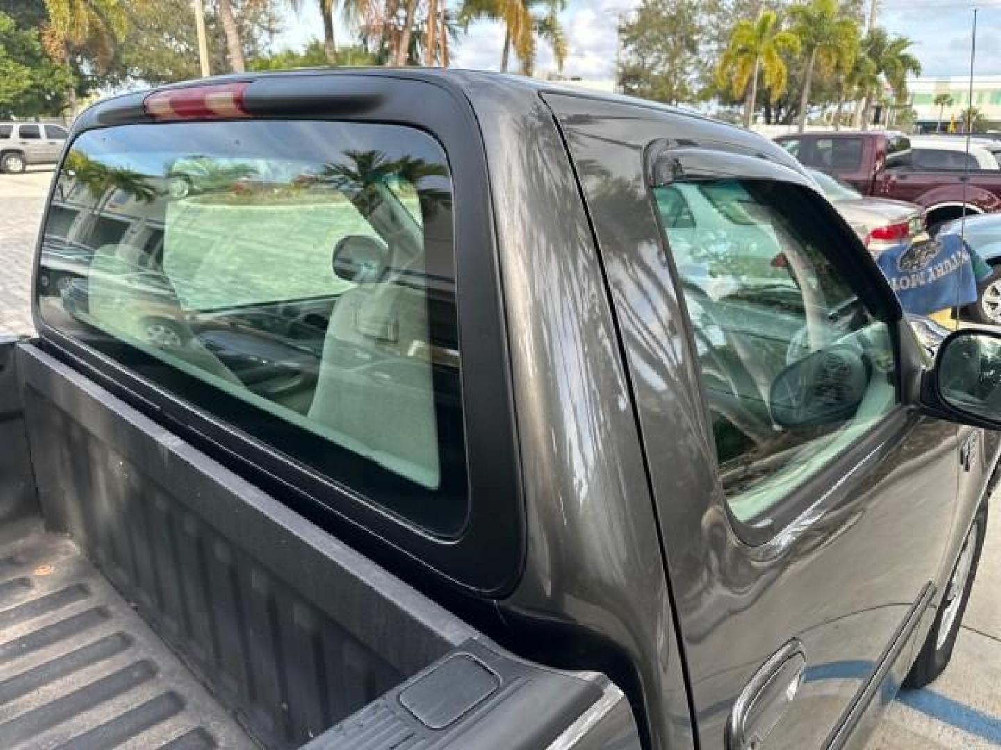 2002 Dark Shadow Grey Metallic /Medium Graphite Ford F-150 XL LOW MILES 56,147 AC (1FTRF17W82N) with an 4.6L SEFI OHC V8 Triton Engine engine, Automatic transmission, located at 4701 North Dixie Hwy, Pompano Beach, FL, 33064, (954) 422-2889, 26.240938, -80.123474 - OUR WEBPAGE FLORIDACARS1.COM HAS OVER 100 PHOTOS AND FREE CARFAX LINK 2002 FORD F-150 XL VIN: 1FTRF17W82NA79722 PICKUP 4.6L V8 F SOHC 16V GASOLINE REAR WHEEL DRIVE 8FT BED LINE-X Bed Liner Long Bed Cloth Seats Tow Hitch THIS IS ONE OF THE NICEST FORDS WE HAVE EVER LISTED, 1 OWNER! TRUCK HAS A 8FT BE - Photo#44