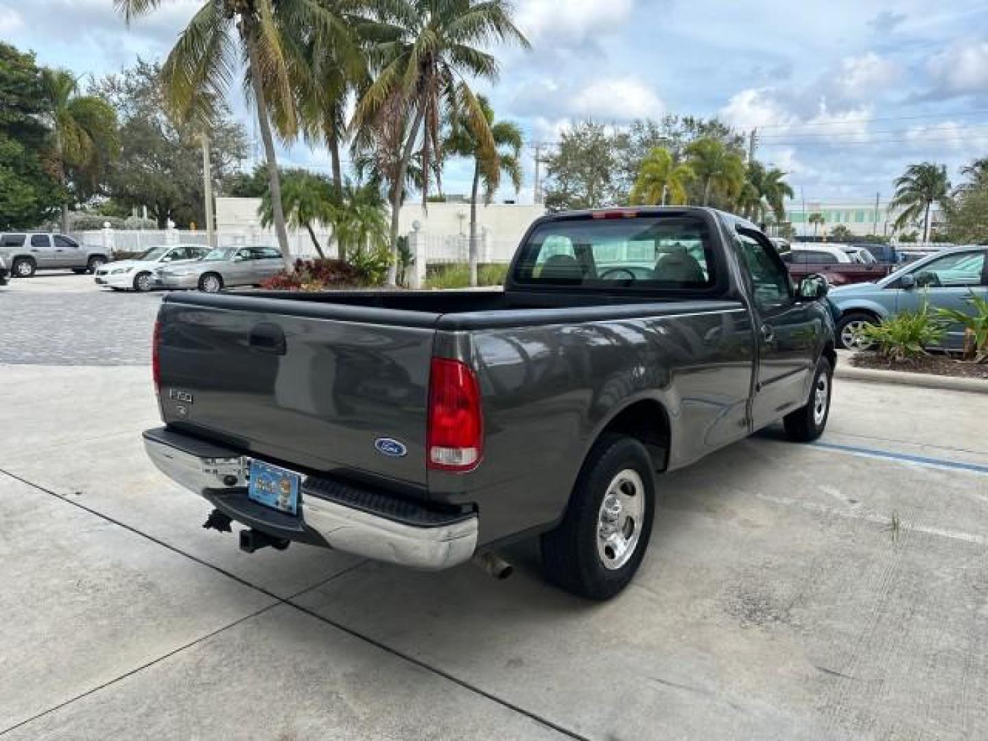 2002 Dark Shadow Grey Metallic /Medium Graphite Ford F-150 XL LOW MILES 56,147 AC (1FTRF17W82N) with an 4.6L SEFI OHC V8 Triton Engine engine, Automatic transmission, located at 4701 North Dixie Hwy, Pompano Beach, FL, 33064, (954) 422-2889, 26.240938, -80.123474 - OUR WEBPAGE FLORIDACARS1.COM HAS OVER 100 PHOTOS AND FREE CARFAX LINK 2002 FORD F-150 XL VIN: 1FTRF17W82NA79722 PICKUP 4.6L V8 F SOHC 16V GASOLINE REAR WHEEL DRIVE 8FT BED LINE-X Bed Liner Long Bed Cloth Seats Tow Hitch THIS IS ONE OF THE NICEST FORDS WE HAVE EVER LISTED, 1 OWNER! TRUCK HAS A 8FT BE - Photo#7