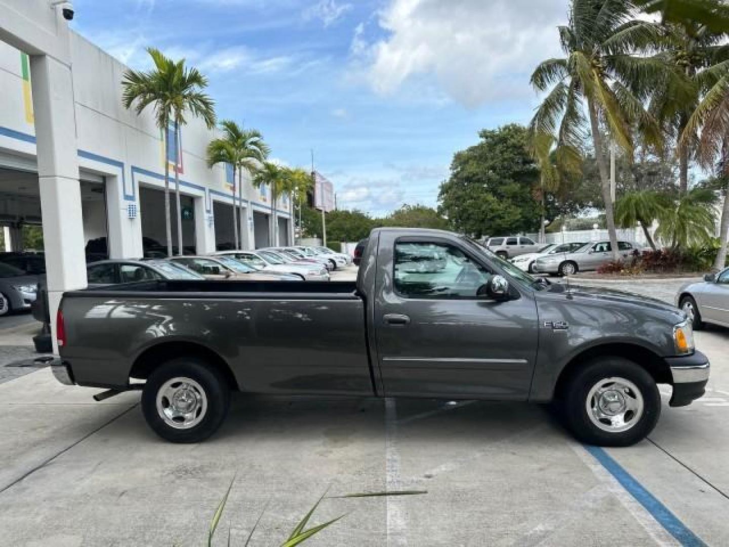 2002 Dark Shadow Grey Metallic /Medium Graphite Ford F-150 XL LOW MILES 56,147 AC (1FTRF17W82N) with an 4.6L SEFI OHC V8 Triton Engine engine, Automatic transmission, located at 4701 North Dixie Hwy, Pompano Beach, FL, 33064, (954) 422-2889, 26.240938, -80.123474 - OUR WEBPAGE FLORIDACARS1.COM HAS OVER 100 PHOTOS AND FREE CARFAX LINK 2002 FORD F-150 XL VIN: 1FTRF17W82NA79722 PICKUP 4.6L V8 F SOHC 16V GASOLINE REAR WHEEL DRIVE 8FT BED LINE-X Bed Liner Long Bed Cloth Seats Tow Hitch THIS IS ONE OF THE NICEST FORDS WE HAVE EVER LISTED, 1 OWNER! TRUCK HAS A 8FT BE - Photo#8