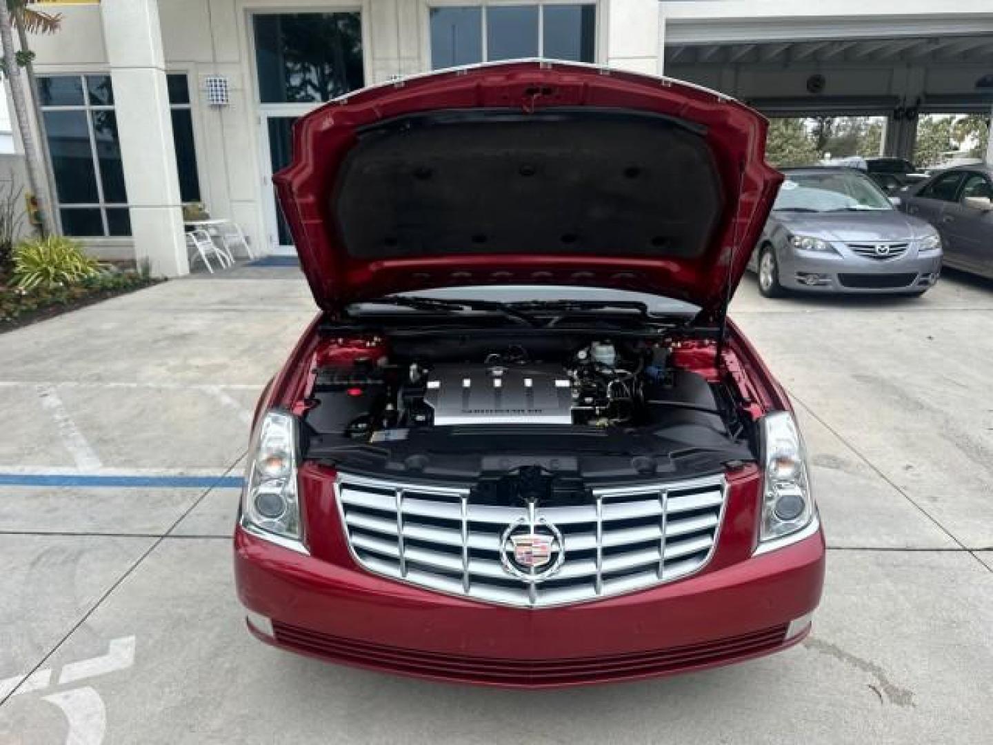 2010 Crystal Red Tintcoat /Titanium/Dark Titanium Cadillac DTS Low Miles 25,493 Sunroof (1G6KD5EY9AU) with an Northstar 4.6L DOHC V8 Engine engine, Automatic transmission, located at 4701 North Dixie Hwy, Pompano Beach, FL, 33064, (954) 422-2889, 26.240938, -80.123474 - OUR WEBPAGE FLORIDACARS1.COM HAS OVER 100 PHOTOS AND FREE CARFAX LINK 2010 CADILLAC DTS LUXURY COLLECTION CRYSTAL RED TRICOAT BEAUTIFUL VIN: 1G6KD5EY9AU108445 SEDAN 4 DR 4.6L V8 F DOHC 32V GASOLINE FRONT WHEEL DRIVE A/C Seat(s) Parking Sensors Alloy Wheels Rear Air Conditioning Front Seat Heaters Re - Photo#27