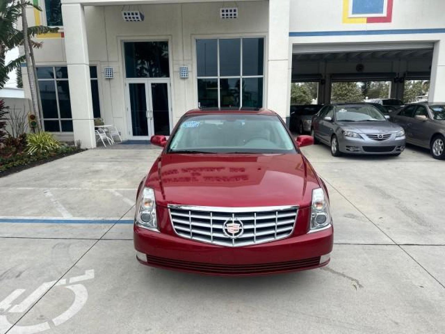 2010 Crystal Red Tintcoat /Titanium/Dark Titanium Cadillac DTS Low Miles 25,493 Sunroof (1G6KD5EY9AU) with an Northstar 4.6L DOHC V8 Engine engine, Automatic transmission, located at 4701 North Dixie Hwy, Pompano Beach, FL, 33064, (954) 422-2889, 26.240938, -80.123474 - OUR WEBPAGE FLORIDACARS1.COM HAS OVER 100 PHOTOS AND FREE CARFAX LINK 2010 CADILLAC DTS LUXURY COLLECTION CRYSTAL RED TRICOAT BEAUTIFUL VIN: 1G6KD5EY9AU108445 SEDAN 4 DR 4.6L V8 F DOHC 32V GASOLINE FRONT WHEEL DRIVE A/C Seat(s) Parking Sensors Alloy Wheels Rear Air Conditioning Front Seat Heaters Re - Photo#2