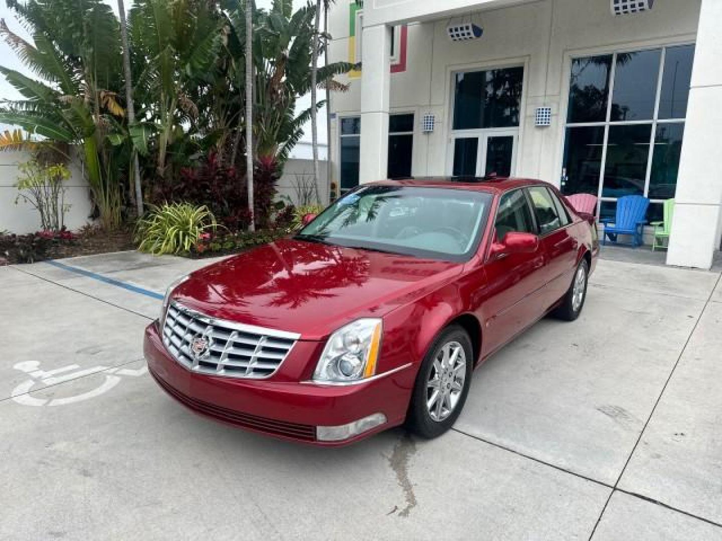 2010 Crystal Red Tintcoat /Titanium/Dark Titanium Cadillac DTS Low Miles 25,493 Sunroof (1G6KD5EY9AU) with an Northstar 4.6L DOHC V8 Engine engine, Automatic transmission, located at 4701 North Dixie Hwy, Pompano Beach, FL, 33064, (954) 422-2889, 26.240938, -80.123474 - OUR WEBPAGE FLORIDACARS1.COM HAS OVER 100 PHOTOS AND FREE CARFAX LINK 2010 CADILLAC DTS LUXURY COLLECTION CRYSTAL RED TRICOAT BEAUTIFUL VIN: 1G6KD5EY9AU108445 SEDAN 4 DR 4.6L V8 F DOHC 32V GASOLINE FRONT WHEEL DRIVE A/C Seat(s) Parking Sensors Alloy Wheels Rear Air Conditioning Front Seat Heaters Re - Photo#3