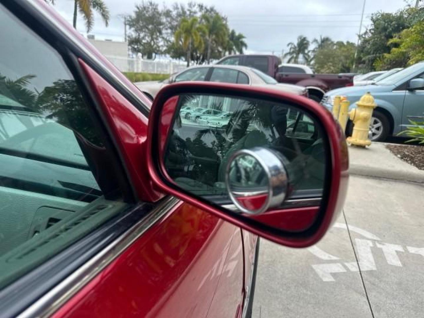 2010 Crystal Red Tintcoat /Titanium/Dark Titanium Cadillac DTS Low Miles 25,493 Sunroof (1G6KD5EY9AU) with an Northstar 4.6L DOHC V8 Engine engine, Automatic transmission, located at 4701 North Dixie Hwy, Pompano Beach, FL, 33064, (954) 422-2889, 26.240938, -80.123474 - OUR WEBPAGE FLORIDACARS1.COM HAS OVER 100 PHOTOS AND FREE CARFAX LINK 2010 CADILLAC DTS LUXURY COLLECTION CRYSTAL RED TRICOAT BEAUTIFUL VIN: 1G6KD5EY9AU108445 SEDAN 4 DR 4.6L V8 F DOHC 32V GASOLINE FRONT WHEEL DRIVE A/C Seat(s) Parking Sensors Alloy Wheels Rear Air Conditioning Front Seat Heaters Re - Photo#40