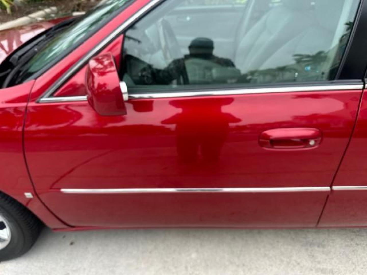 2010 Crystal Red Tintcoat /Titanium/Dark Titanium Cadillac DTS Low Miles 25,493 Sunroof (1G6KD5EY9AU) with an Northstar 4.6L DOHC V8 Engine engine, Automatic transmission, located at 4701 North Dixie Hwy, Pompano Beach, FL, 33064, (954) 422-2889, 26.240938, -80.123474 - OUR WEBPAGE FLORIDACARS1.COM HAS OVER 100 PHOTOS AND FREE CARFAX LINK 2010 CADILLAC DTS LUXURY COLLECTION CRYSTAL RED TRICOAT BEAUTIFUL VIN: 1G6KD5EY9AU108445 SEDAN 4 DR 4.6L V8 F DOHC 32V GASOLINE FRONT WHEEL DRIVE A/C Seat(s) Parking Sensors Alloy Wheels Rear Air Conditioning Front Seat Heaters Re - Photo#44