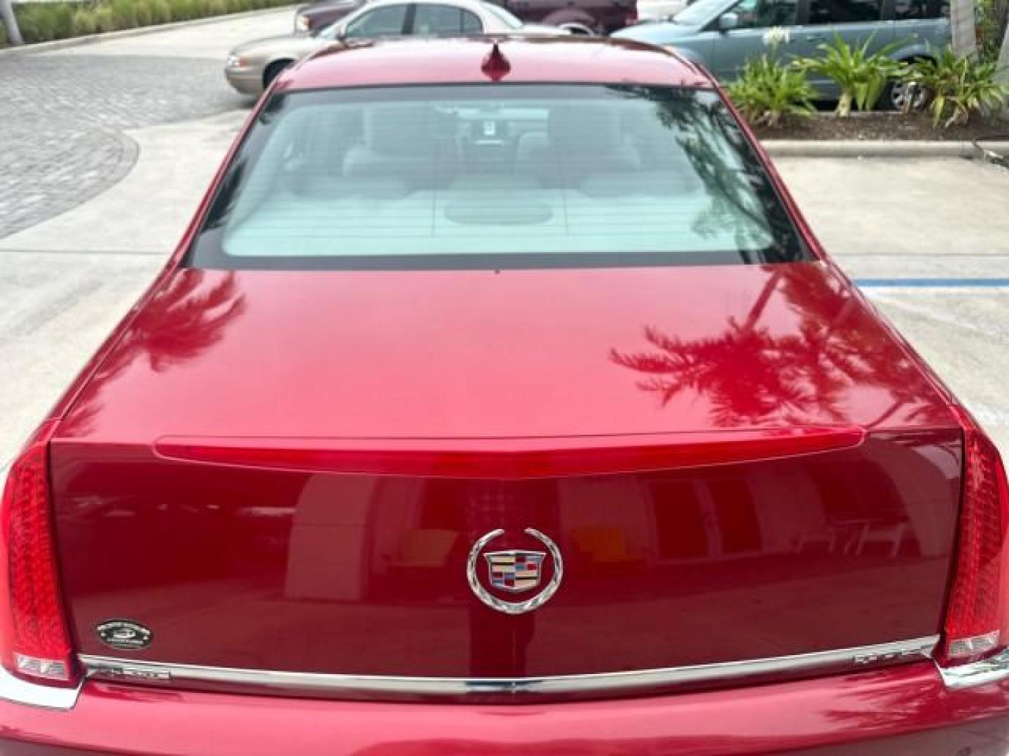 2010 Crystal Red Tintcoat /Titanium/Dark Titanium Cadillac DTS Low Miles 25,493 Sunroof (1G6KD5EY9AU) with an Northstar 4.6L DOHC V8 Engine engine, Automatic transmission, located at 4701 North Dixie Hwy, Pompano Beach, FL, 33064, (954) 422-2889, 26.240938, -80.123474 - OUR WEBPAGE FLORIDACARS1.COM HAS OVER 100 PHOTOS AND FREE CARFAX LINK 2010 CADILLAC DTS LUXURY COLLECTION CRYSTAL RED TRICOAT BEAUTIFUL VIN: 1G6KD5EY9AU108445 SEDAN 4 DR 4.6L V8 F DOHC 32V GASOLINE FRONT WHEEL DRIVE A/C Seat(s) Parking Sensors Alloy Wheels Rear Air Conditioning Front Seat Heaters Re - Photo#56