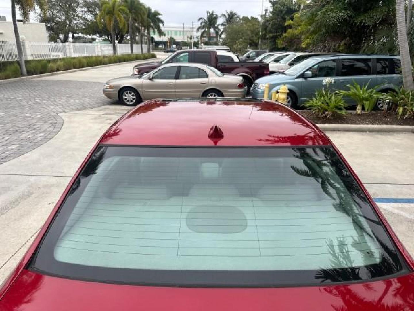 2010 Crystal Red Tintcoat /Titanium/Dark Titanium Cadillac DTS Low Miles 25,493 Sunroof (1G6KD5EY9AU) with an Northstar 4.6L DOHC V8 Engine engine, Automatic transmission, located at 4701 North Dixie Hwy, Pompano Beach, FL, 33064, (954) 422-2889, 26.240938, -80.123474 - OUR WEBPAGE FLORIDACARS1.COM HAS OVER 100 PHOTOS AND FREE CARFAX LINK 2010 CADILLAC DTS LUXURY COLLECTION CRYSTAL RED TRICOAT BEAUTIFUL VIN: 1G6KD5EY9AU108445 SEDAN 4 DR 4.6L V8 F DOHC 32V GASOLINE FRONT WHEEL DRIVE A/C Seat(s) Parking Sensors Alloy Wheels Rear Air Conditioning Front Seat Heaters Re - Photo#61