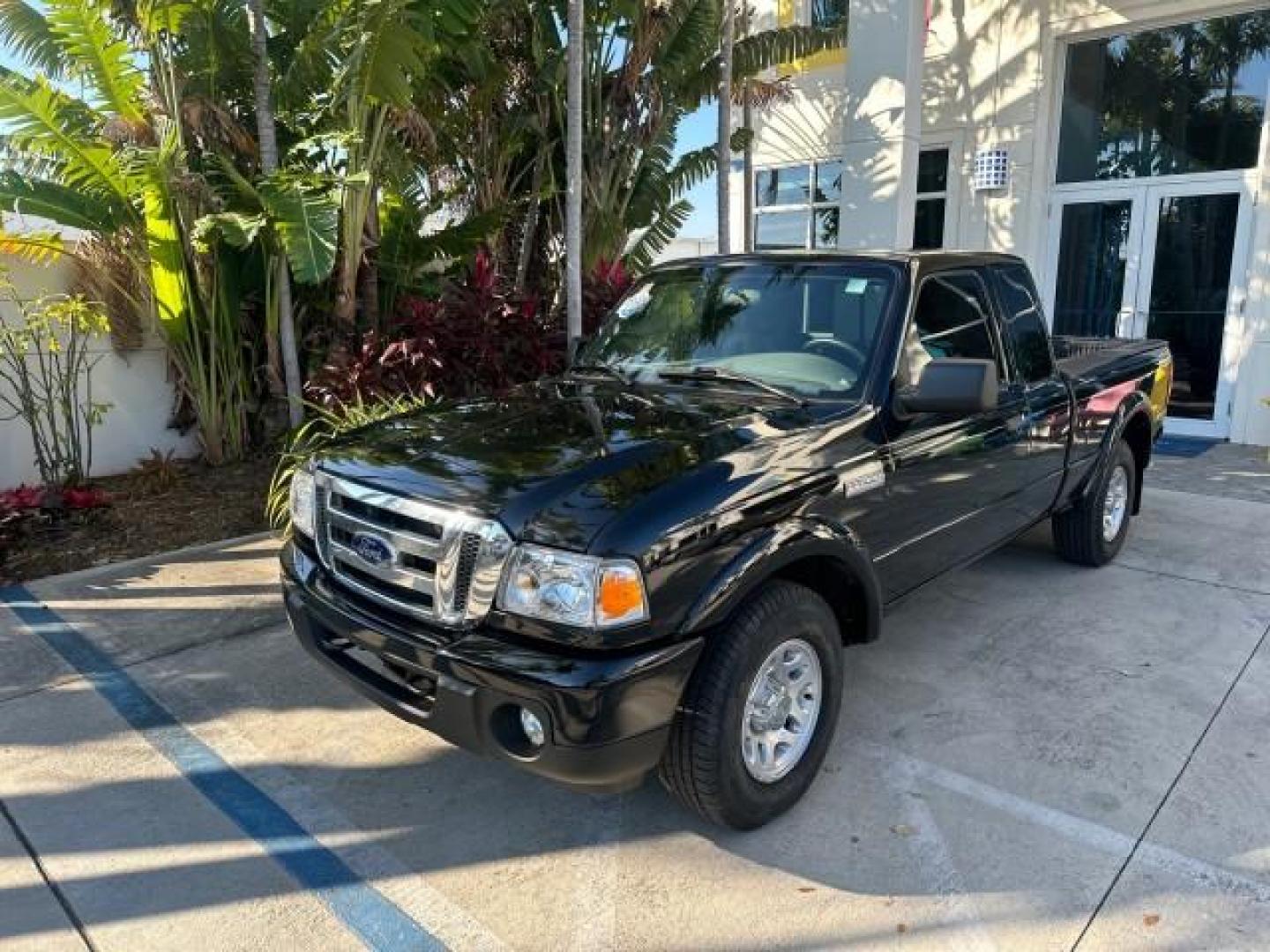 2010 Black /Medium Dark Flint Ford Ranger XLT4X4 LOW MILES 65,570 1 OWNER (1FTLR4FE4AP) with an 4.0L SOHC V6 Engine engine, Automatic transmission, located at 4701 North Dixie Hwy, Pompano Beach, FL, 33064, (954) 422-2889, 26.240938, -80.123474 - OUR WEBPAGE FLORIDACARS1.COM HAS OVER 100 PHOTOS AND FREE CARFAX LINK 2010 FORD RANGER XLT VIN: 1FTLR4FE4APA50079 4 DOOR EXTENDED CAB PICKUP 4.0L V6 F SOHC 12V GASOLINE REAR WHEEL DRIVE W/ 4X4 4WD/AWD Cloth Seats Alloy Wheels Satellite Radio Ready Bed Liner THIS IS ONE OF THE NICEST FORDS WE HAVE EV - Photo#3