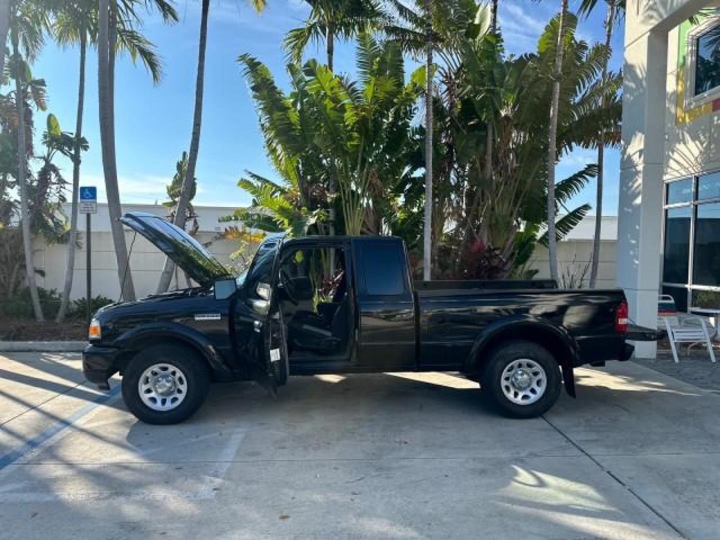 2010 Black /Medium Dark Flint Ford Ranger XLT4X4 LOW MILES 65,570 1 OWNER (1FTLR4FE4AP) with an 4.0L SOHC V6 Engine engine, Automatic transmission, located at 4701 North Dixie Hwy, Pompano Beach, FL, 33064, (954) 422-2889, 26.240938, -80.123474 - OUR WEBPAGE FLORIDACARS1.COM HAS OVER 100 PHOTOS AND FREE CARFAX LINK 2010 FORD RANGER XLT VIN: 1FTLR4FE4APA50079 4 DOOR EXTENDED CAB PICKUP 4.0L V6 F SOHC 12V GASOLINE REAR WHEEL DRIVE W/ 4X4 4WD/AWD Cloth Seats Alloy Wheels Satellite Radio Ready Bed Liner THIS IS ONE OF THE NICEST FORDS WE HAVE EV - Photo#8