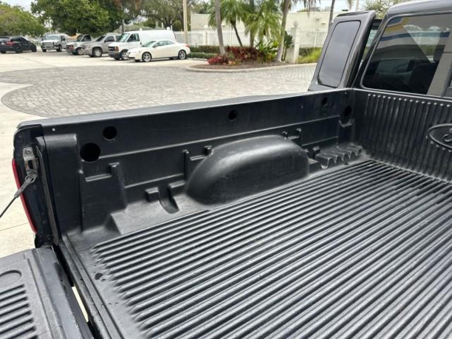 2010 Black /Medium Dark Flint Ford Ranger XLT4X4 LOW MILES 65,570 1 OWNER (1FTLR4FE4AP) with an 4.0L SOHC V6 Engine engine, Automatic transmission, located at 4701 North Dixie Hwy, Pompano Beach, FL, 33064, (954) 422-2889, 26.240938, -80.123474 - OUR WEBPAGE FLORIDACARS1.COM HAS OVER 100 PHOTOS AND FREE CARFAX LINK 2010 FORD RANGER XLT VIN: 1FTLR4FE4APA50079 4 DOOR EXTENDED CAB PICKUP 4.0L V6 F SOHC 12V GASOLINE REAR WHEEL DRIVE W/ 4X4 4WD/AWD Cloth Seats Alloy Wheels Satellite Radio Ready Bed Liner THIS IS ONE OF THE NICEST FORDS WE HAVE EV - Photo#15