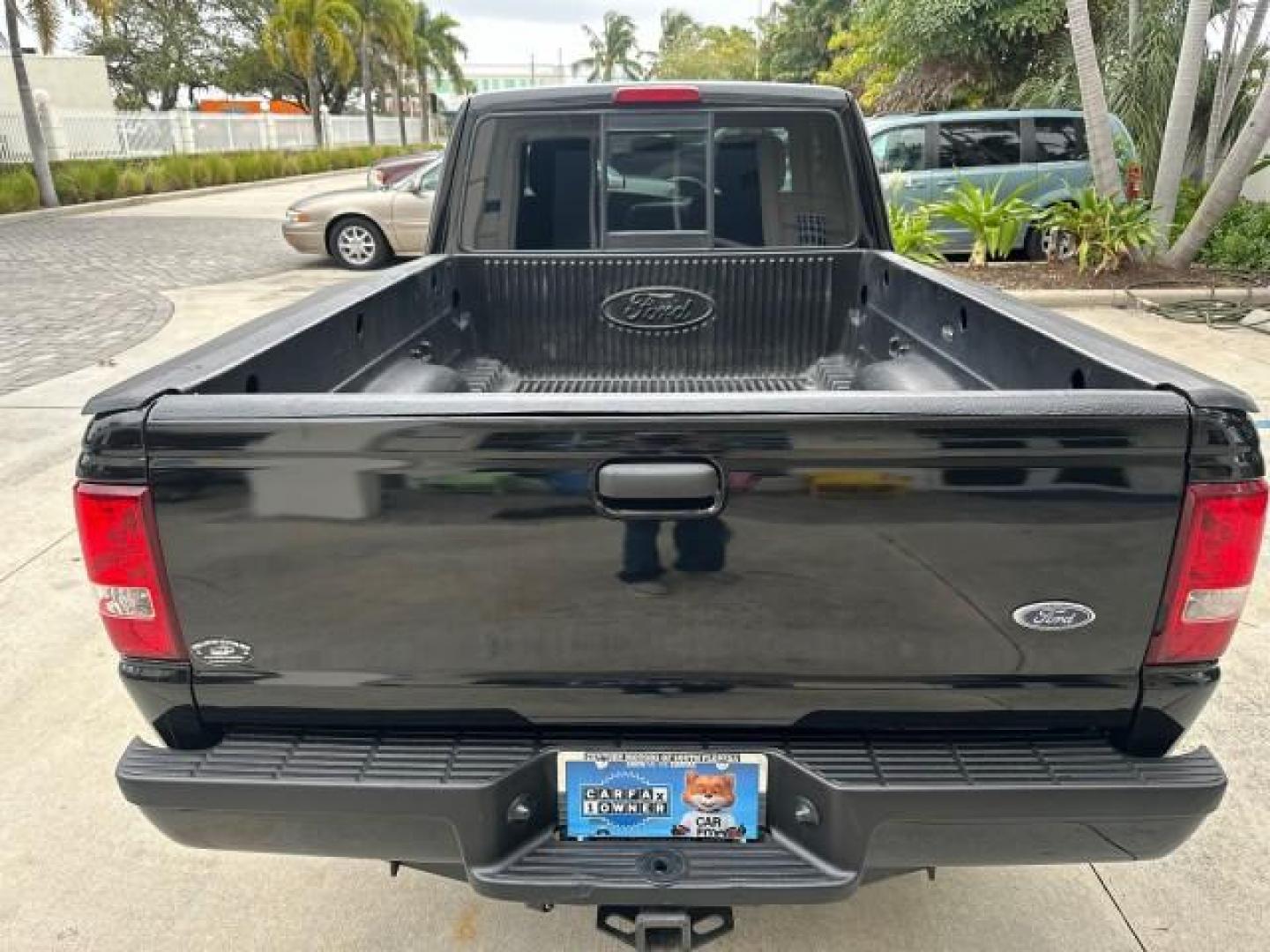 2010 Black /Medium Dark Flint Ford Ranger XLT4X4 LOW MILES 65,570 1 OWNER (1FTLR4FE4AP) with an 4.0L SOHC V6 Engine engine, Automatic transmission, located at 4701 North Dixie Hwy, Pompano Beach, FL, 33064, (954) 422-2889, 26.240938, -80.123474 - OUR WEBPAGE FLORIDACARS1.COM HAS OVER 100 PHOTOS AND FREE CARFAX LINK 2010 FORD RANGER XLT VIN: 1FTLR4FE4APA50079 4 DOOR EXTENDED CAB PICKUP 4.0L V6 F SOHC 12V GASOLINE REAR WHEEL DRIVE W/ 4X4 4WD/AWD Cloth Seats Alloy Wheels Satellite Radio Ready Bed Liner THIS IS ONE OF THE NICEST FORDS WE HAVE EV - Photo#43