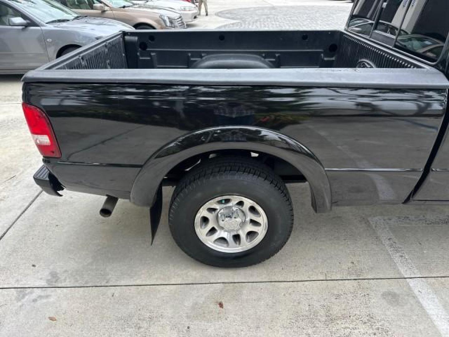 2010 Black /Medium Dark Flint Ford Ranger XLT4X4 LOW MILES 65,570 1 OWNER (1FTLR4FE4AP) with an 4.0L SOHC V6 Engine engine, Automatic transmission, located at 4701 North Dixie Hwy, Pompano Beach, FL, 33064, (954) 422-2889, 26.240938, -80.123474 - OUR WEBPAGE FLORIDACARS1.COM HAS OVER 100 PHOTOS AND FREE CARFAX LINK 2010 FORD RANGER XLT VIN: 1FTLR4FE4APA50079 4 DOOR EXTENDED CAB PICKUP 4.0L V6 F SOHC 12V GASOLINE REAR WHEEL DRIVE W/ 4X4 4WD/AWD Cloth Seats Alloy Wheels Satellite Radio Ready Bed Liner THIS IS ONE OF THE NICEST FORDS WE HAVE EV - Photo#46