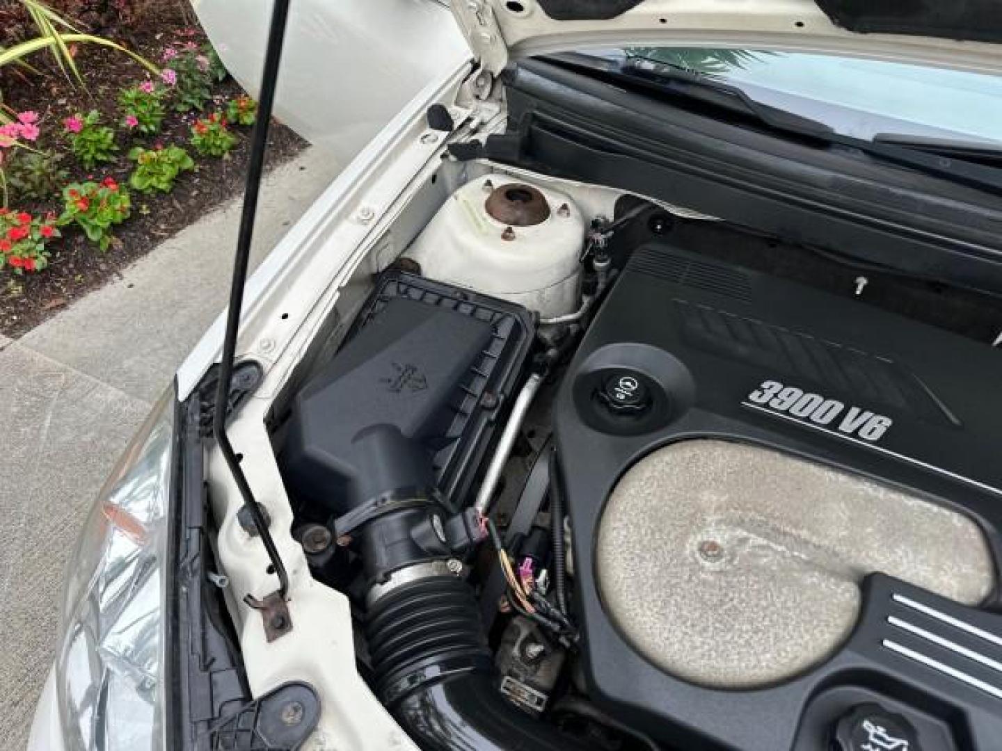 2007 Ivory White /Light Taupe Pontiac G6 GT CONV LOW MILES 54,300 (1G2ZH361274) with an 3.9L V6 SFI Engine engine, Automatic transmission, located at 4701 North Dixie Hwy, Pompano Beach, FL, 33064, (954) 422-2889, 26.240938, -80.123474 - OUR WEBPAGE FLORIDACARS1.COM HAS OVER 100 PHOTOS AND FREE CARFAX LINK 2007 PONTIAC G6 GT VIN: 1G2ZH361274262062 CONVERTIBLE 3.9L V6 F GASOLINE FRONT WHEEL DRIVE Alloy Wheels Monsoon Sound Front Seat Heaters Premium Package Hard Top Remote Start Leather Seats Satellite Radio Ready THIS IS ONE OF THE - Photo#35