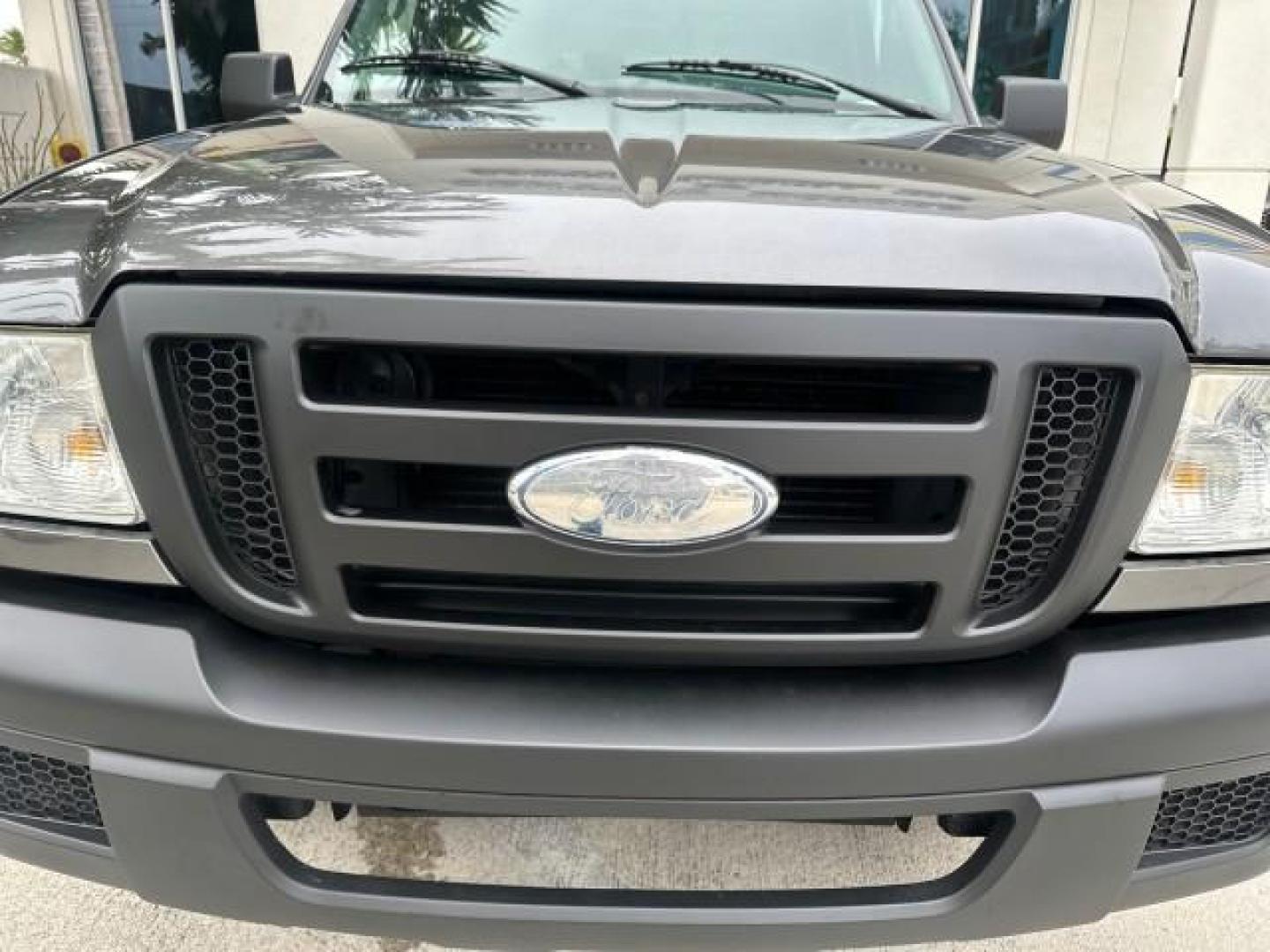 2007 Dark Shadow Grey Metallic /Medium Dk Flint Ford Ranger XLT Low Miles 58,244 Camper Top (1FTYR10D57P) with an 2.3L DOHC 16-Valve I4 Engine engine, Automatic transmission, located at 4701 North Dixie Hwy, Pompano Beach, FL, 33064, (954) 422-2889, 26.240938, -80.123474 - OUR WEBPAGE FLORIDACARS1.COM HAS OVER 100 PHOTOS AND FREE CARFAX LINK 2007 FORD RANGER XLT CAMPER TOPPER VIN: 1FTYR10D57PA51979 PICKUP 2.3L 4 F GASOLINE REAR WHEEL DRIVE Bed Cover Cloth Seats Bed Liner THIS IS ONE OF THE NICEST FORDS WE HAVE EVER LISTED,3 OWNER FLORIDA TITLE. BRAND NEW THIS VEHICLE - Photo#38