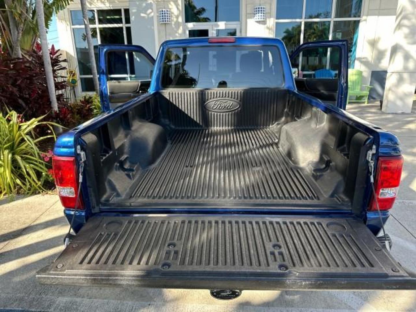 2010 Vista Blue Metallic /Medium Dark Flint Ford Ranger XLT X CAB LOW MILES 57,020 (1FTKR1ED4AP) with an 2.3L DOHC 16-Valve I4 Engine engine, Automatic transmission, located at 4701 North Dixie Hwy, Pompano Beach, FL, 33064, (954) 422-2889, 26.240938, -80.123474 - OUR WEBPAGE FLORIDACARS1.COM HAS OVER 100 PHOTOS AND FREE CARFAX LINK 2010 FORD RANGER XLT VIN: 1FTKR1ED4APA27033 CLUB CAB PICKUP 2.3L I4 F DOHC 16V GASOLINE REAR WHEEL DRIVE Bed Cover Running Boards Bed Liner Satellite Radio Ready Bluetooth Technology Tow Hitch Cloth Seats THIS IS ONE OF THE NICEST - Photo#16