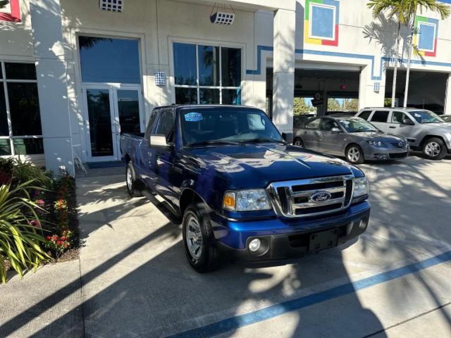 2010 Vista Blue Metallic /Medium Dark Flint Ford Ranger XLT X CAB LOW MILES 57,020 (1FTKR1ED4AP) with an 2.3L DOHC 16-Valve I4 Engine engine, Automatic transmission, located at 4701 North Dixie Hwy, Pompano Beach, FL, 33064, (954) 422-2889, 26.240938, -80.123474 - OUR WEBPAGE FLORIDACARS1.COM HAS OVER 100 PHOTOS AND FREE CARFAX LINK 2010 FORD RANGER XLT VIN: 1FTKR1ED4APA27033 CLUB CAB PICKUP 2.3L I4 F DOHC 16V GASOLINE REAR WHEEL DRIVE Bed Cover Running Boards Bed Liner Satellite Radio Ready Bluetooth Technology Tow Hitch Cloth Seats THIS IS ONE OF THE NICEST - Photo#1