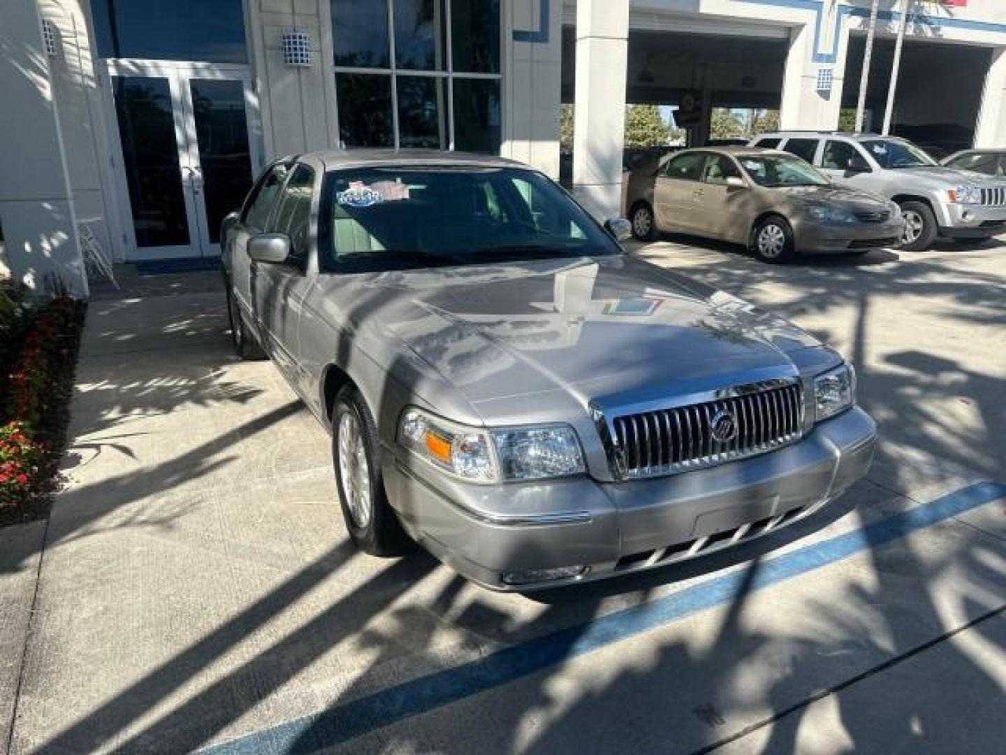 2008 Silver Birch Metallic /Light Camel Mercury Grand Marquis LS 1 OWNER FL 12,426 LOW MILES (2MEFM75V58X) with an 4.6L OHC FFV V8 Engine engine, Automatic transmission, located at 4701 North Dixie Hwy, Pompano Beach, FL, 33064, (954) 422-2889, 26.240938, -80.123474 - OUR WEBPAGE FLORIDACARS1.COM HAS OVER 100 PHOTOS AND FREE CARFAX LINK 2008 MERCURY GRAND MARQUIS LS NON SMOKER VIN: 2MEFM75V58X614887 SEDAN 4 DR 4.6L V8 F SOHC FLEX FUEL REAR WHEEL DRIVE ROAD READY NO ACCIDENTS NO RECALLS FLORIDA 1 OWNER POWER LEATHER SEATS LOW MILES 12,426 Alloy Wheels Leather Seat - Photo#1