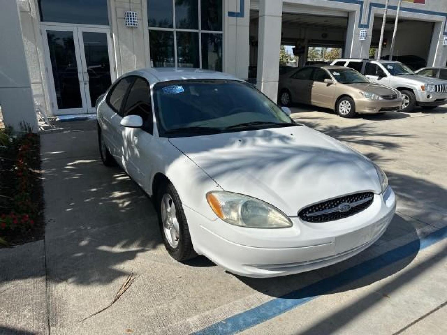 2000 Vibrant White /Medium Graphite Ford Taurus SES LOW MILES 57,736 (1FAFP55S2YA) with an 3.0L V6 Cylinder Engine engine, Automatic transmission, located at 4701 North Dixie Hwy, Pompano Beach, FL, 33064, (954) 422-2889, 26.240938, -80.123474 - OUR WEBPAGE FLORIDACARS1.COM HAS OVER 100 PHOTOS AND FREE CARFAX LINK 2000 FORD TAURUS SES VIN: 1FAFP55S2YA254222 SEDAN 4 DR 3.0L V6 F DOHC 24V GASOLINE FRONT WHEEL DRIVE Cloth Seats ABS Brakes Automatic Transmission Power Locks Power Windows AM/FM Stereo Cassette Player Power Mirrors Rear Defroster - Photo#1