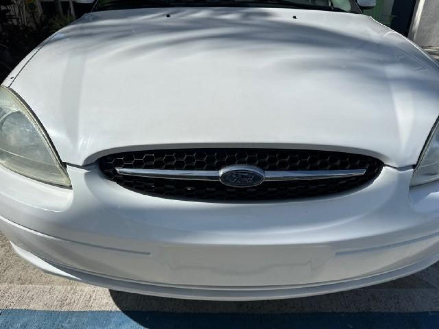 2000 Vibrant White /Medium Graphite Ford Taurus SES LOW MILES 57,736 (1FAFP55S2YA) with an 3.0L V6 Cylinder Engine engine, Automatic transmission, located at 4701 North Dixie Hwy, Pompano Beach, FL, 33064, (954) 422-2889, 26.240938, -80.123474 - OUR WEBPAGE FLORIDACARS1.COM HAS OVER 100 PHOTOS AND FREE CARFAX LINK 2000 FORD TAURUS SES VIN: 1FAFP55S2YA254222 SEDAN 4 DR 3.0L V6 F DOHC 24V GASOLINE FRONT WHEEL DRIVE Cloth Seats ABS Brakes Automatic Transmission Power Locks Power Windows AM/FM Stereo Cassette Player Power Mirrors Rear Defroster - Photo#27