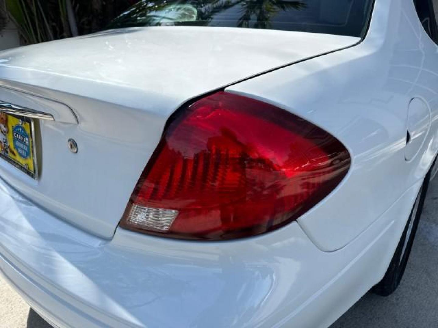 2000 Vibrant White /Medium Graphite Ford Taurus SES LOW MILES 57,736 (1FAFP55S2YA) with an 3.0L V6 Cylinder Engine engine, Automatic transmission, located at 4701 North Dixie Hwy, Pompano Beach, FL, 33064, (954) 422-2889, 26.240938, -80.123474 - OUR WEBPAGE FLORIDACARS1.COM HAS OVER 100 PHOTOS AND FREE CARFAX LINK 2000 FORD TAURUS SES VIN: 1FAFP55S2YA254222 SEDAN 4 DR 3.0L V6 F DOHC 24V GASOLINE FRONT WHEEL DRIVE Cloth Seats ABS Brakes Automatic Transmission Power Locks Power Windows AM/FM Stereo Cassette Player Power Mirrors Rear Defroster - Photo#61